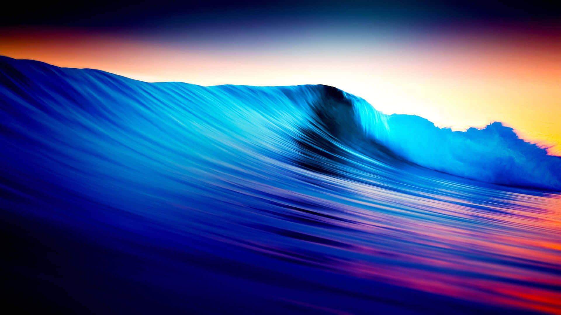 A Blue And Orange Wave At Sunset Wallpaper