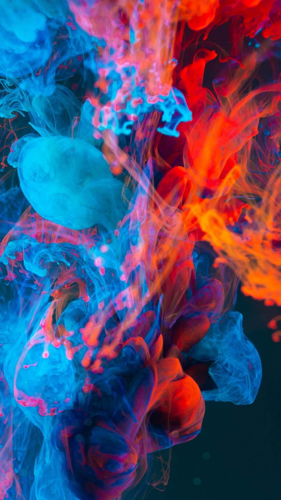 A Colorful Liquid With Blue And Red Colors Wallpaper