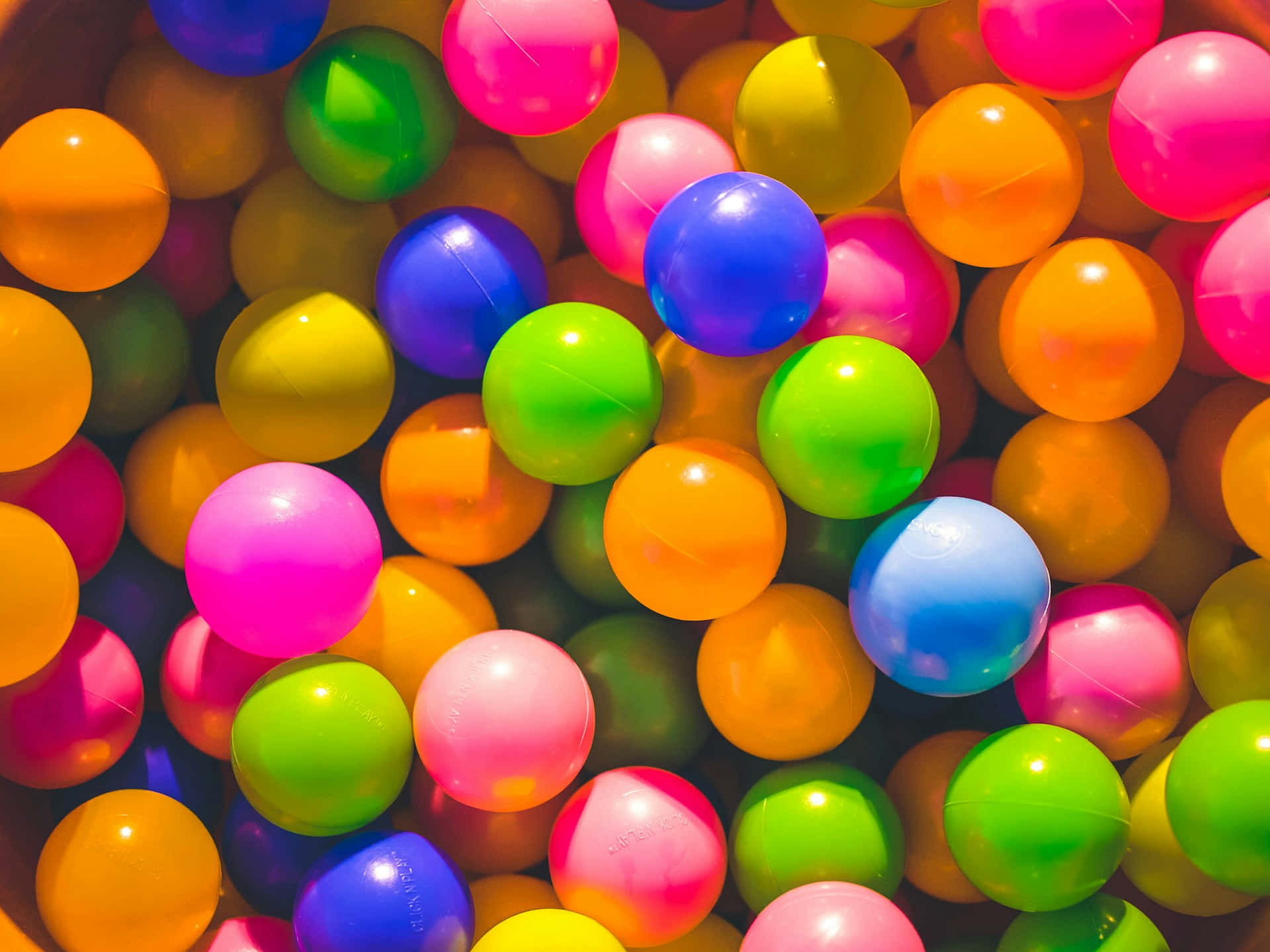 Colorful Plastic Balls Background Wallpaper