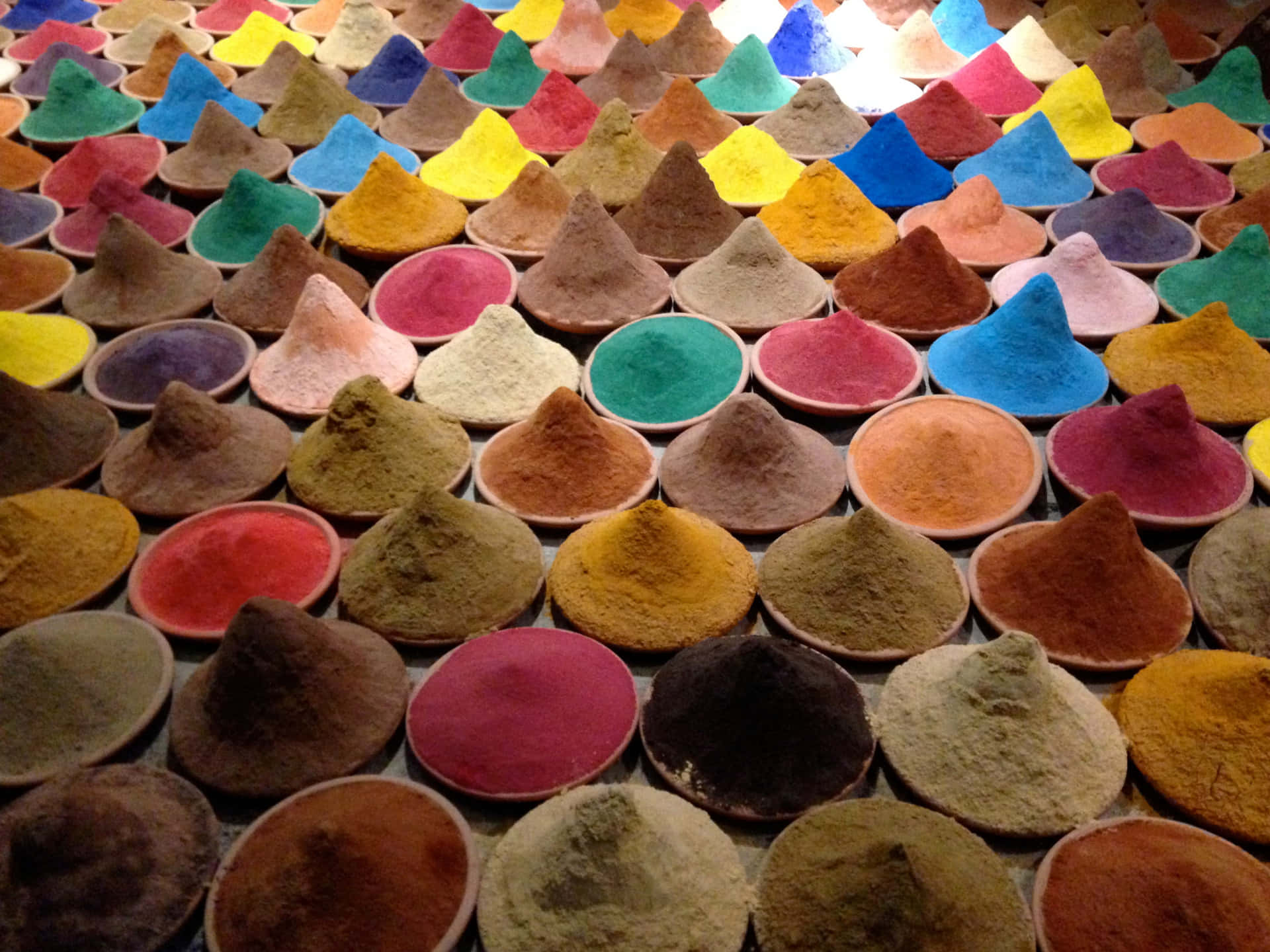 Colorful Powdered Spices On Small Saucers Wallpaper