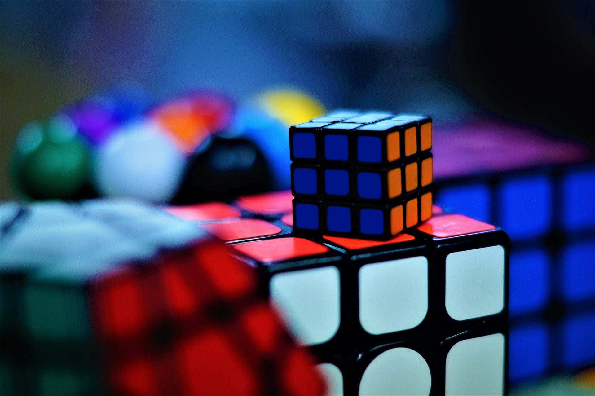 Colorful Rubiks Cubes Focus Wallpaper