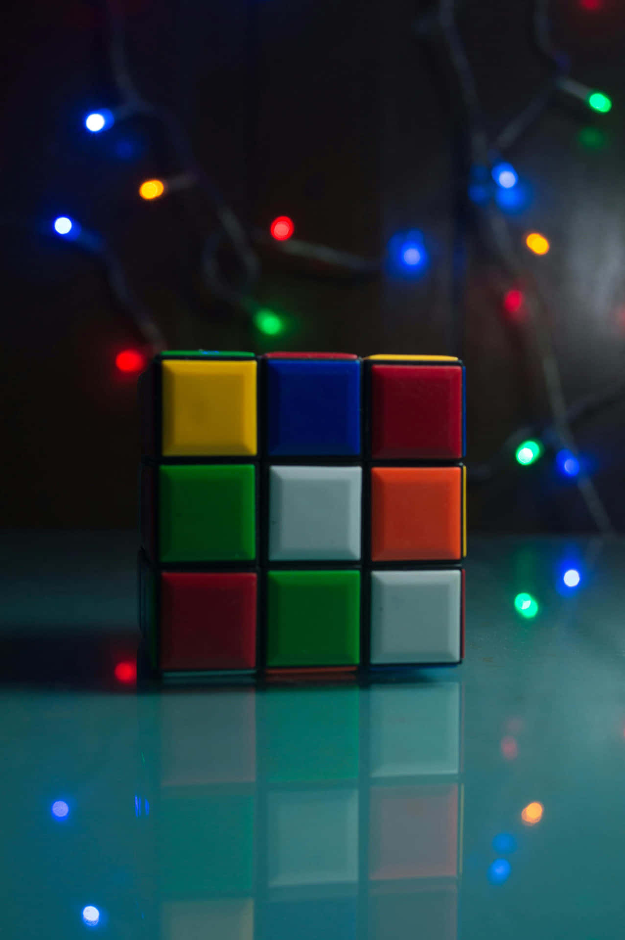 Colorful Rubiks Cubewith Bokeh Lights Wallpaper