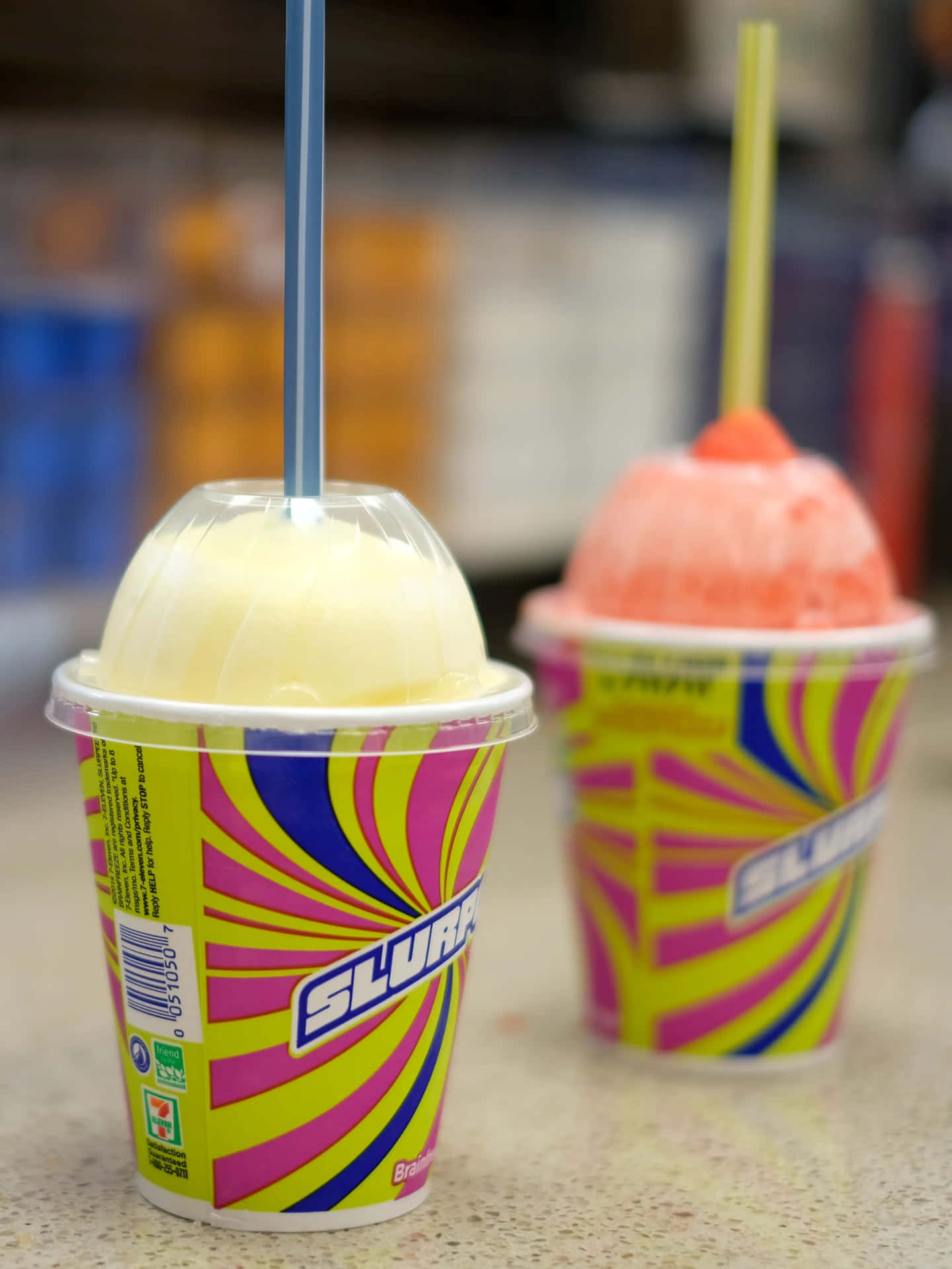 Colorful Slurpee Cups With Straws Wallpaper