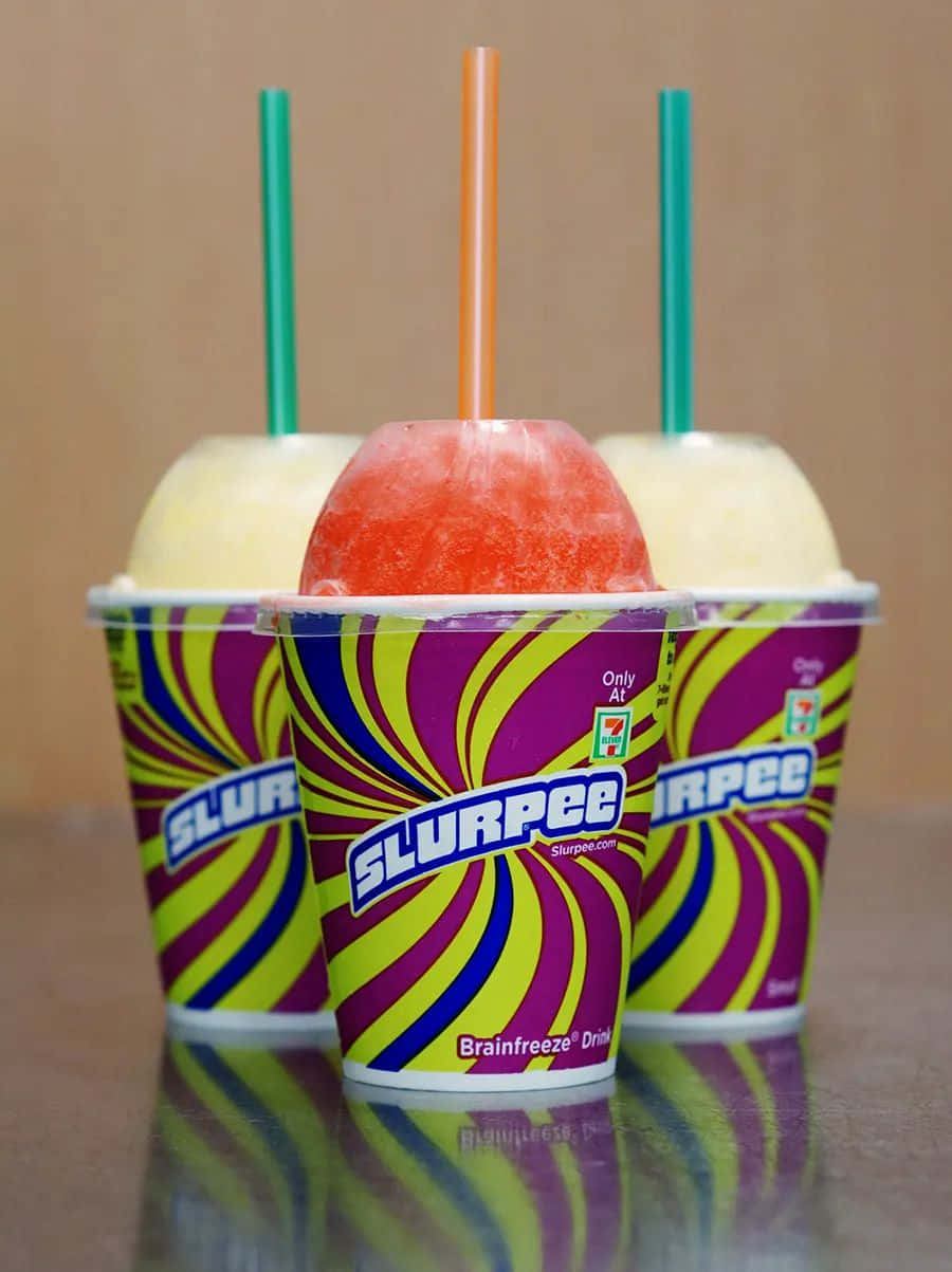 Colorful Slurpee Cups With Straws Wallpaper