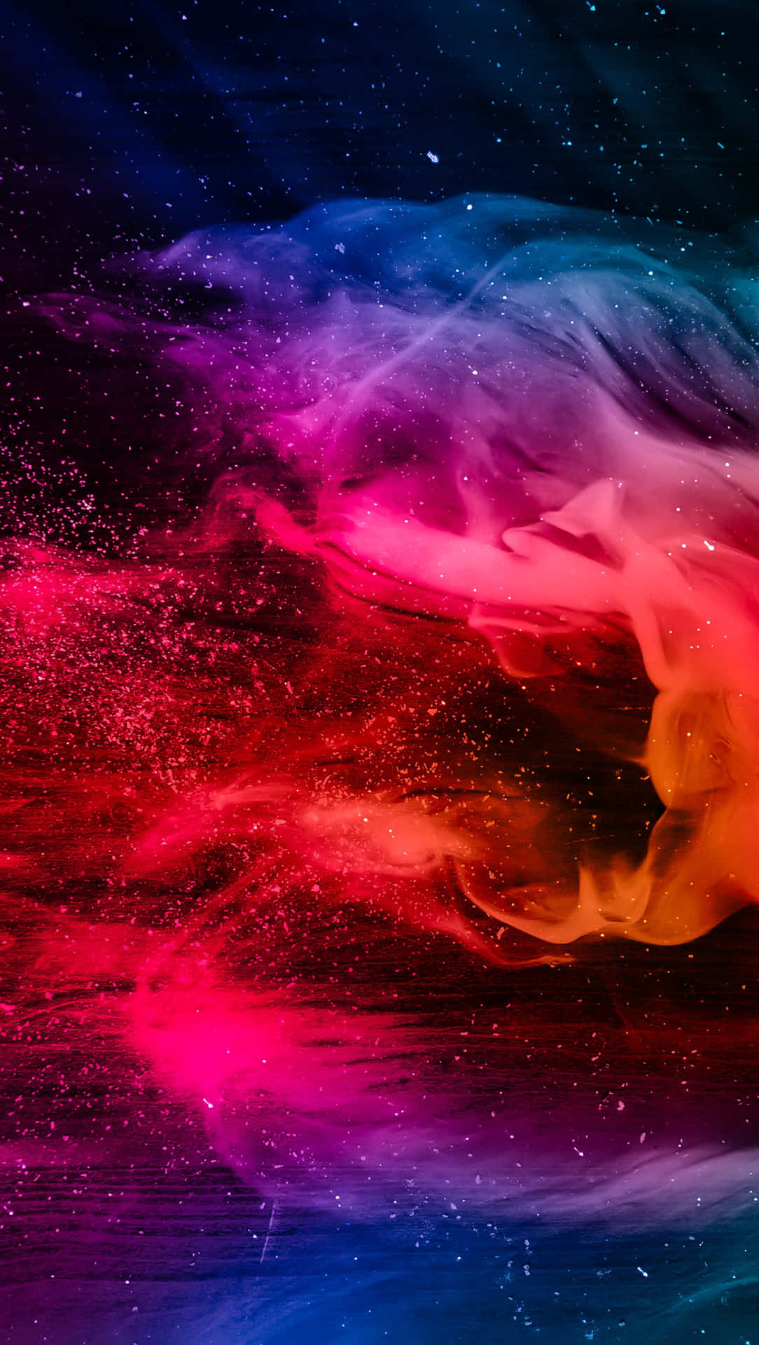 Stunninge udvisning af brøl af farverige røgpartikler. Wallpaper