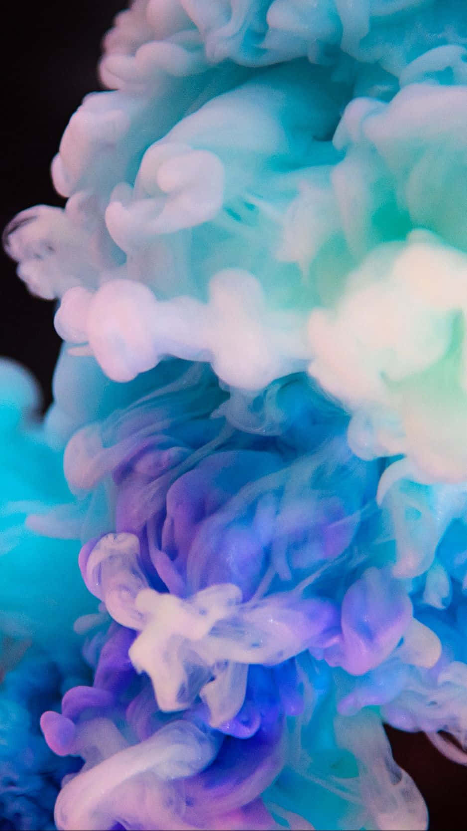 Atemberaubenderfarbenfroher Rauch In Der Luft Wallpaper