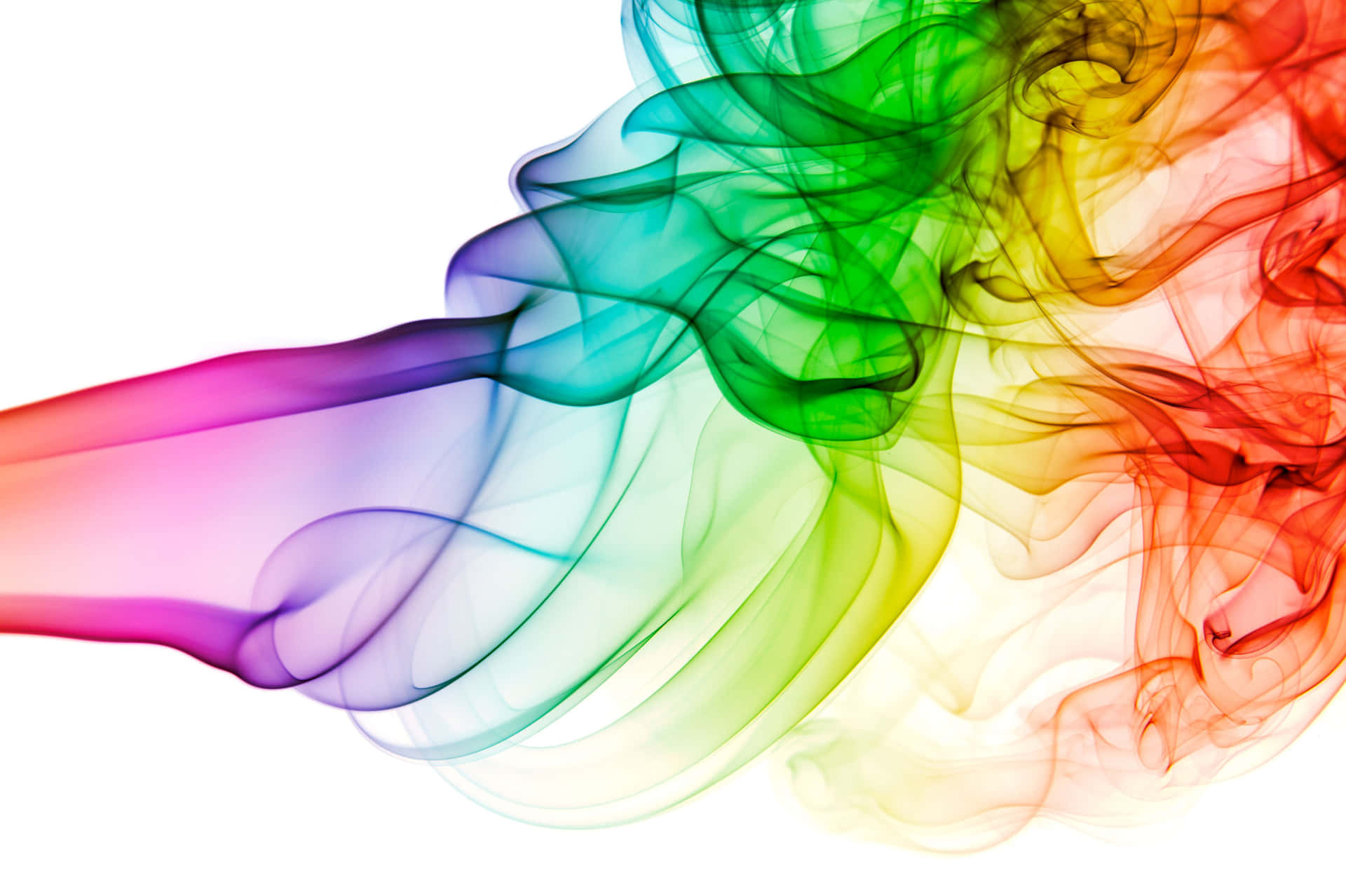A Rainbow Colored Smoke Is Blowing In The Air Wallpaper