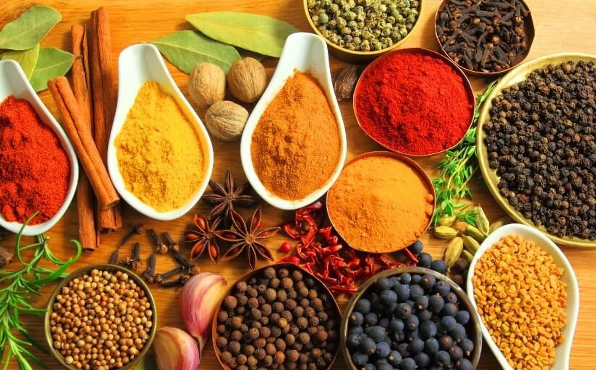 Colorful Spices On Wooden Surface Wallpaper