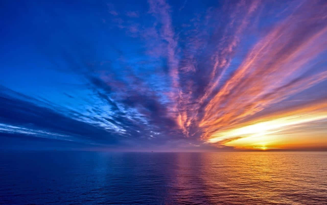 Stunning Colorful Sunset Over The Waters Wallpaper