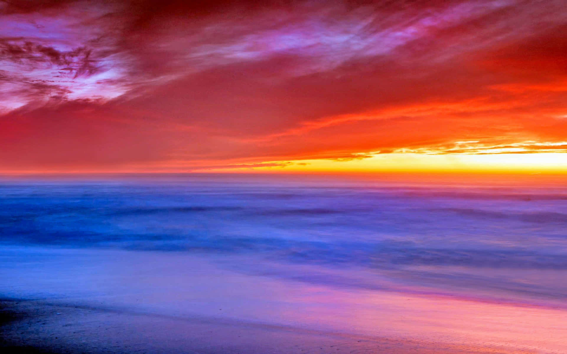 A Vibrant Kaleidoscope of Colors at Sunset Wallpaper