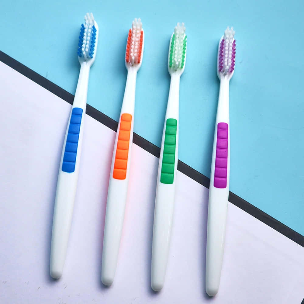 Colorful Toothbrushes Array Wallpaper