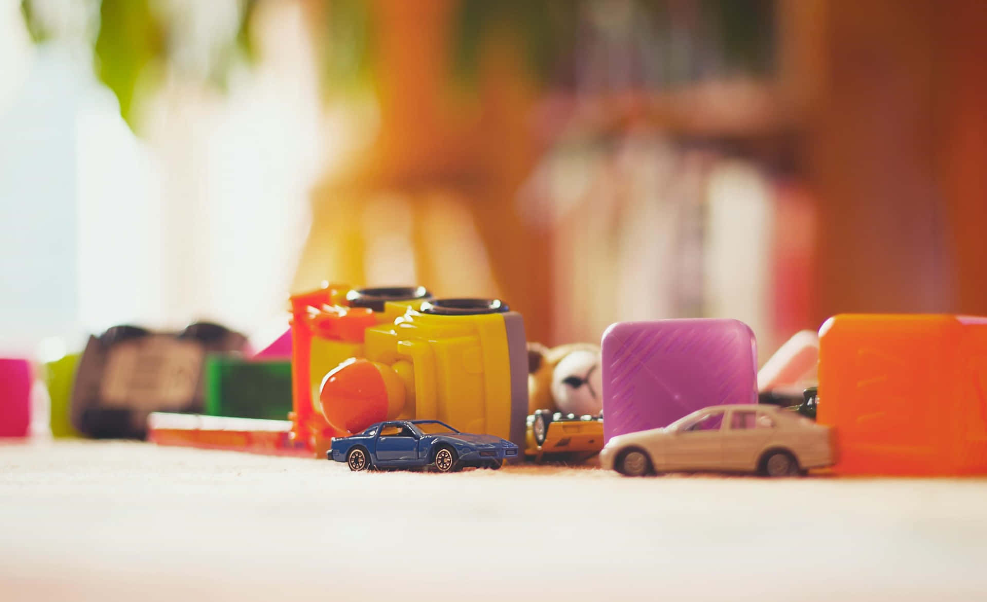 Colorful Toy Assortment Scene Wallpaper