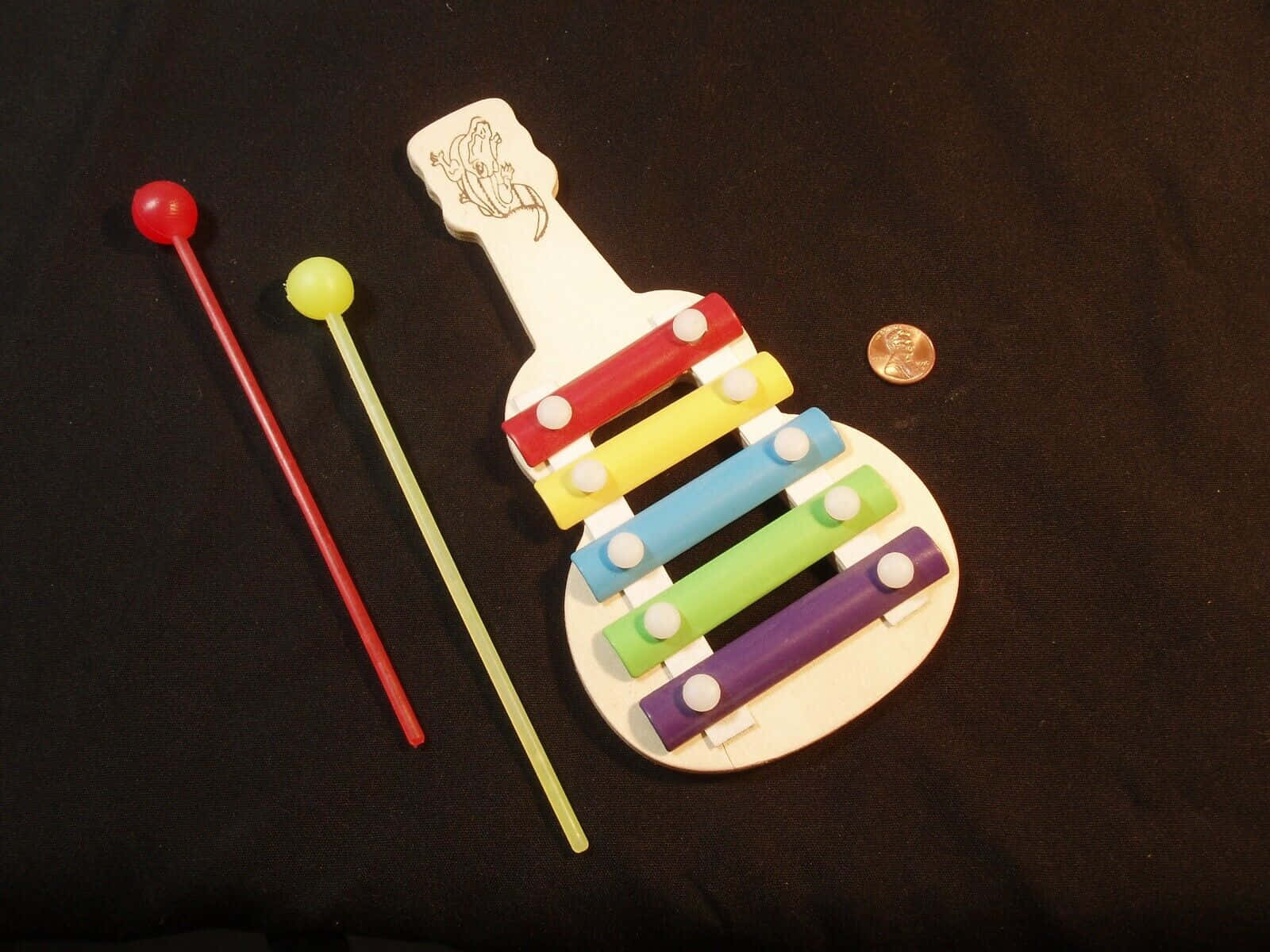 Colorful Toy Xylophonewith Mallets Wallpaper