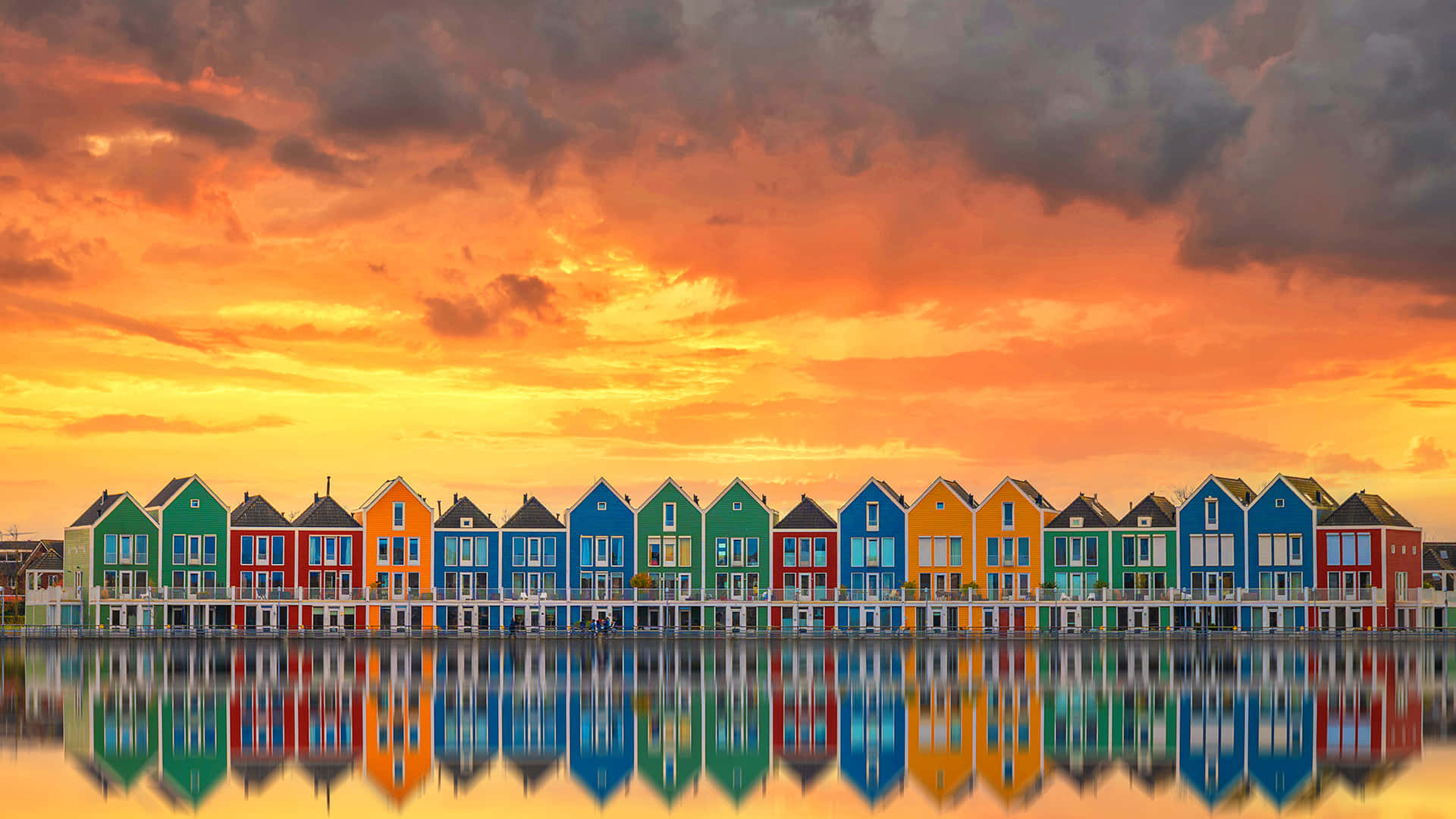 Colorful_ Waterfront_ Houses_at_ Sunset Wallpaper