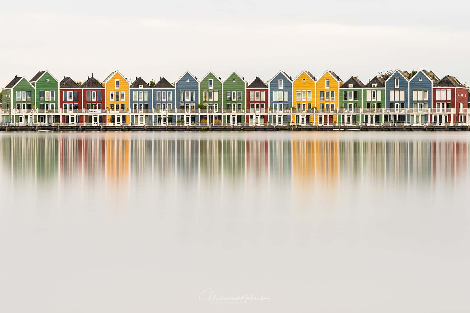 Colorful Waterfront Houses Reflection Wallpaper