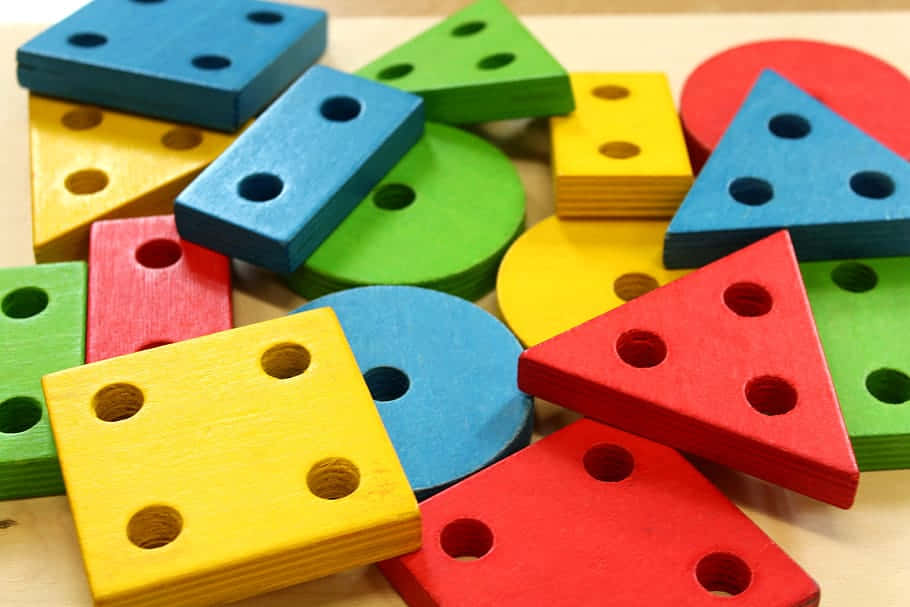 Colorful Wooden Shape Blocks Educational Toys Wallpaper