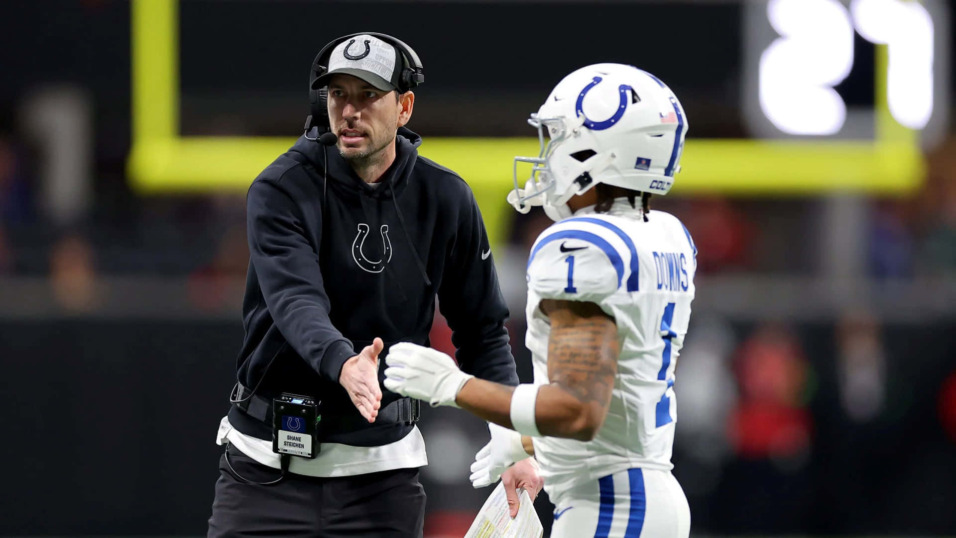 Colts Coach Player Interaction Wallpaper
