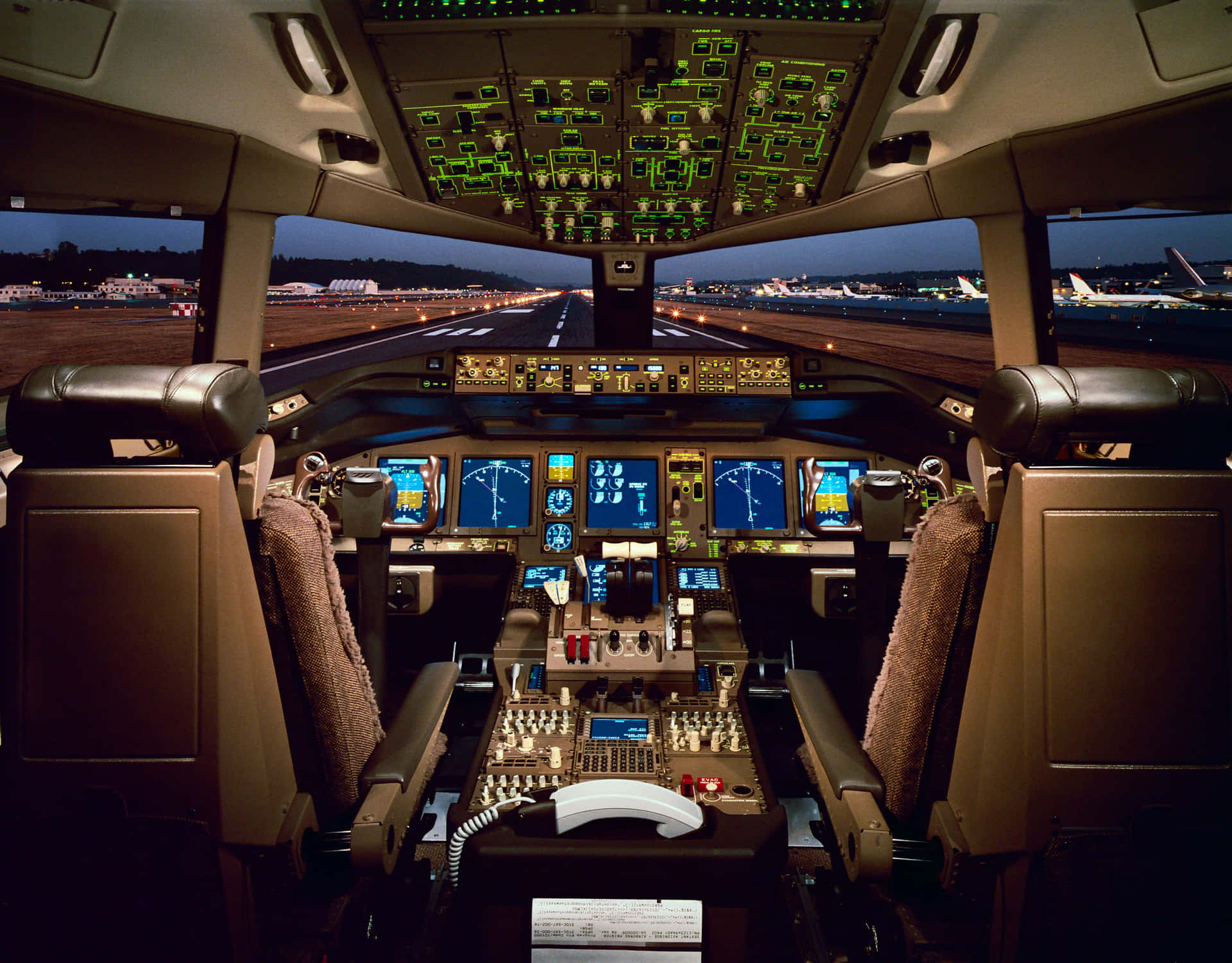 Commercial Airplane Cockpit At Night Wallpaper