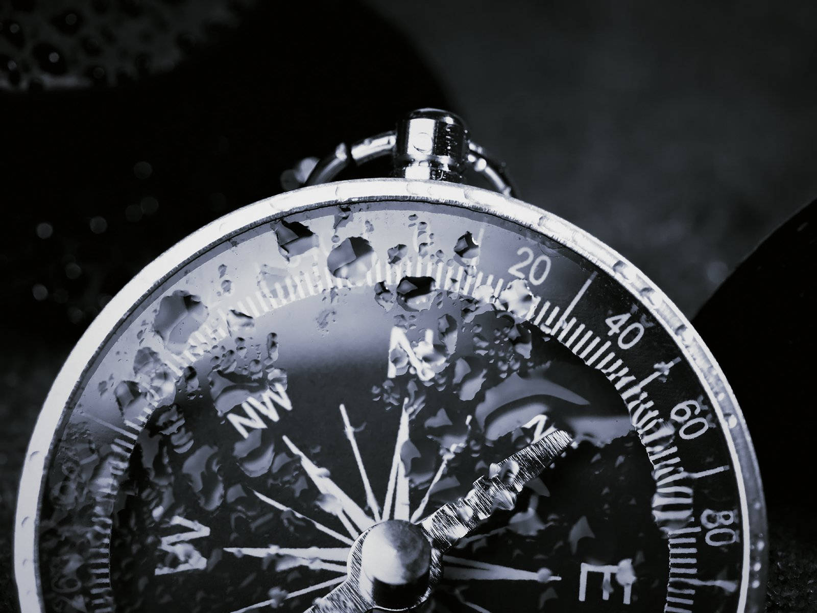 Compass With Water On Cover Background
