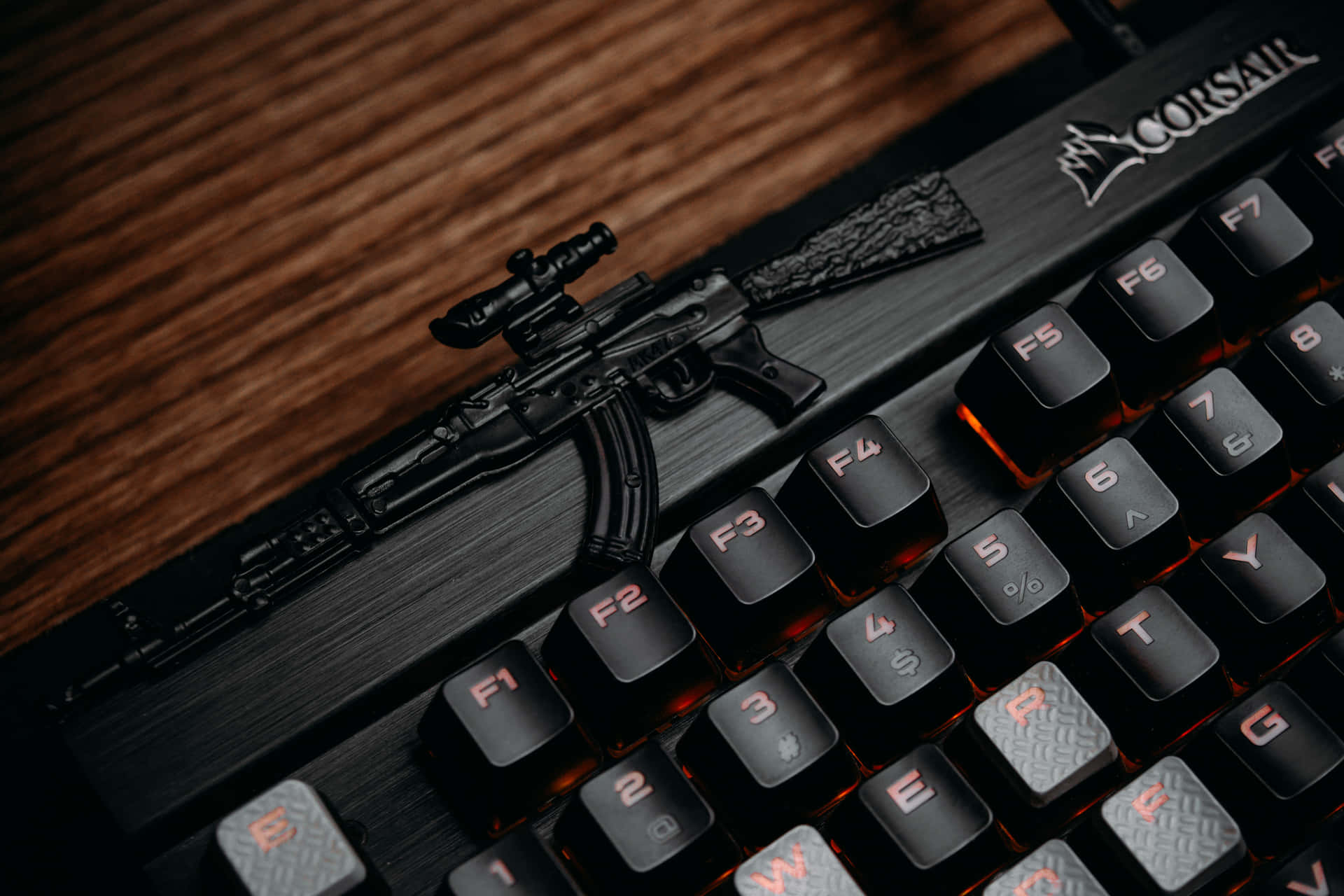 Black Computer Keyboard And Sniper Background