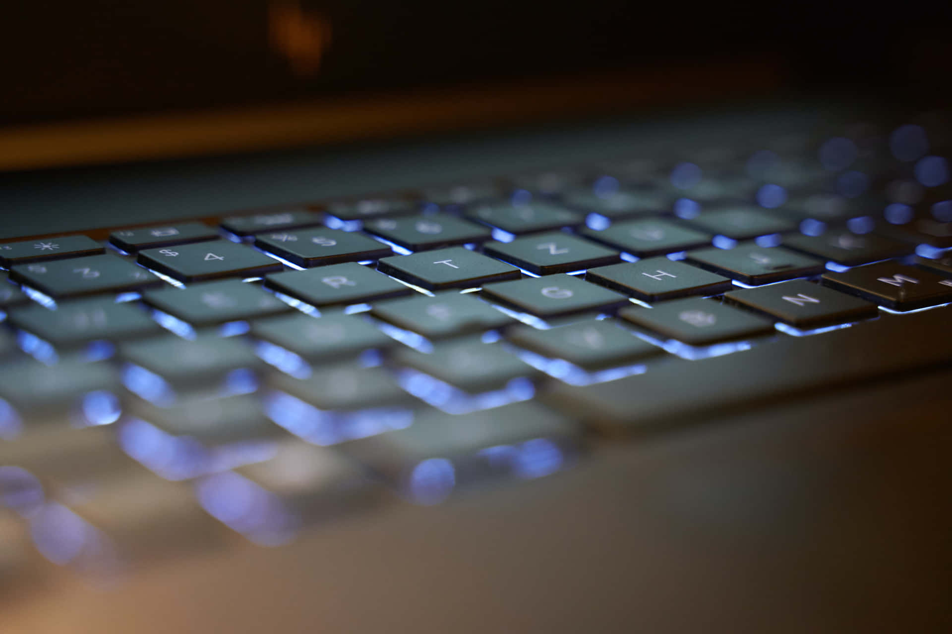 Glowing Blue Keyboard Computer Background