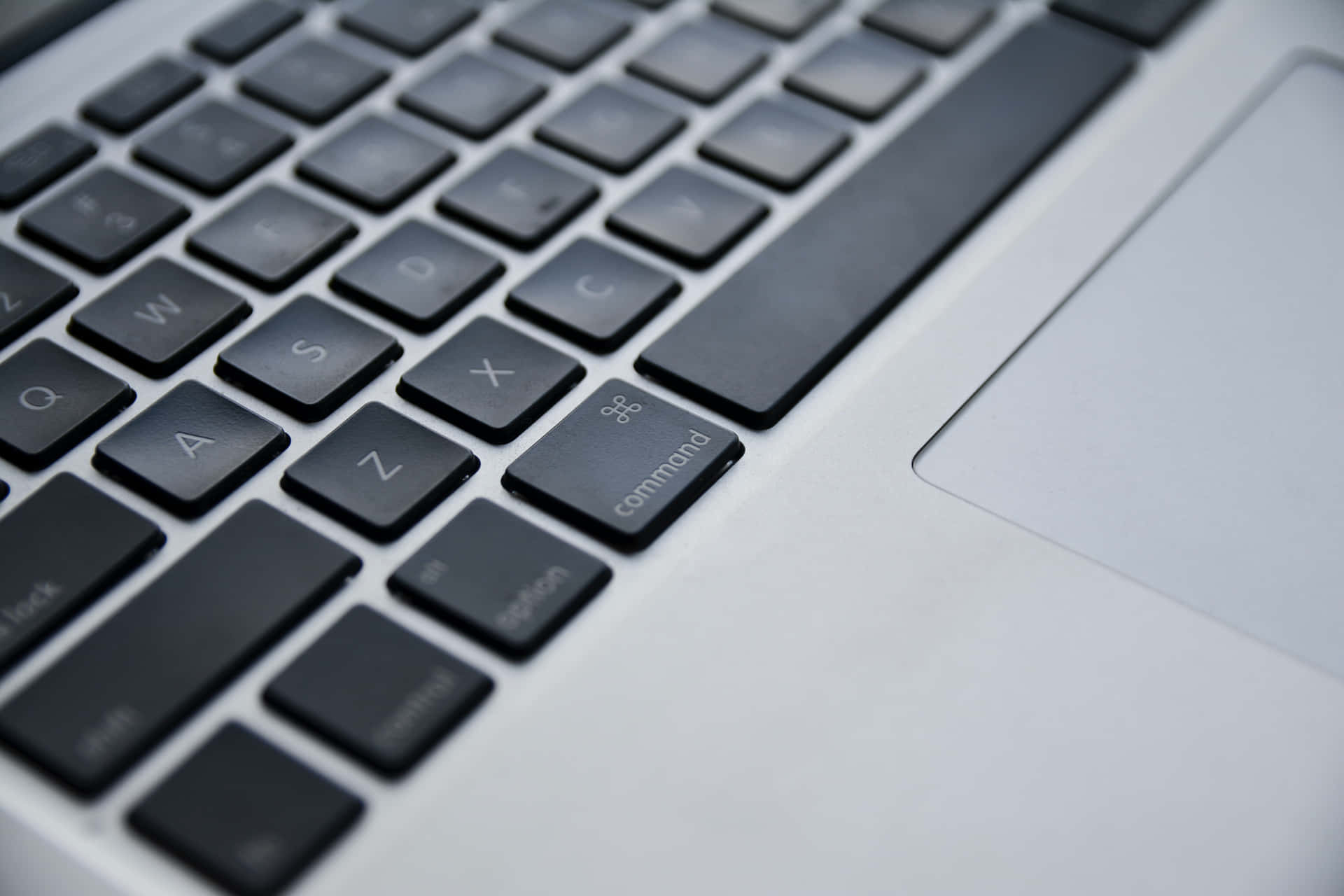 Blurred Laptop Computer Keyboard Background