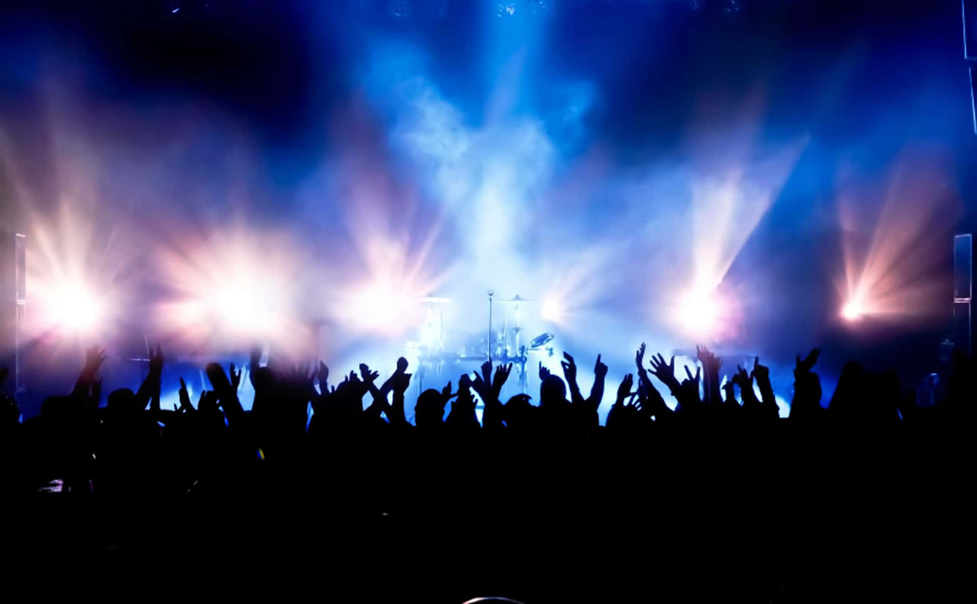 Crowd Silhouette With Stage Lights Concert Background