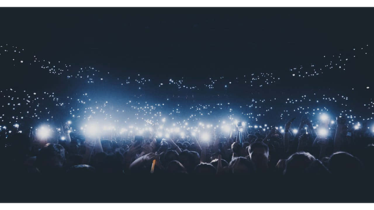 Concert In A Stadium With Flash Lights