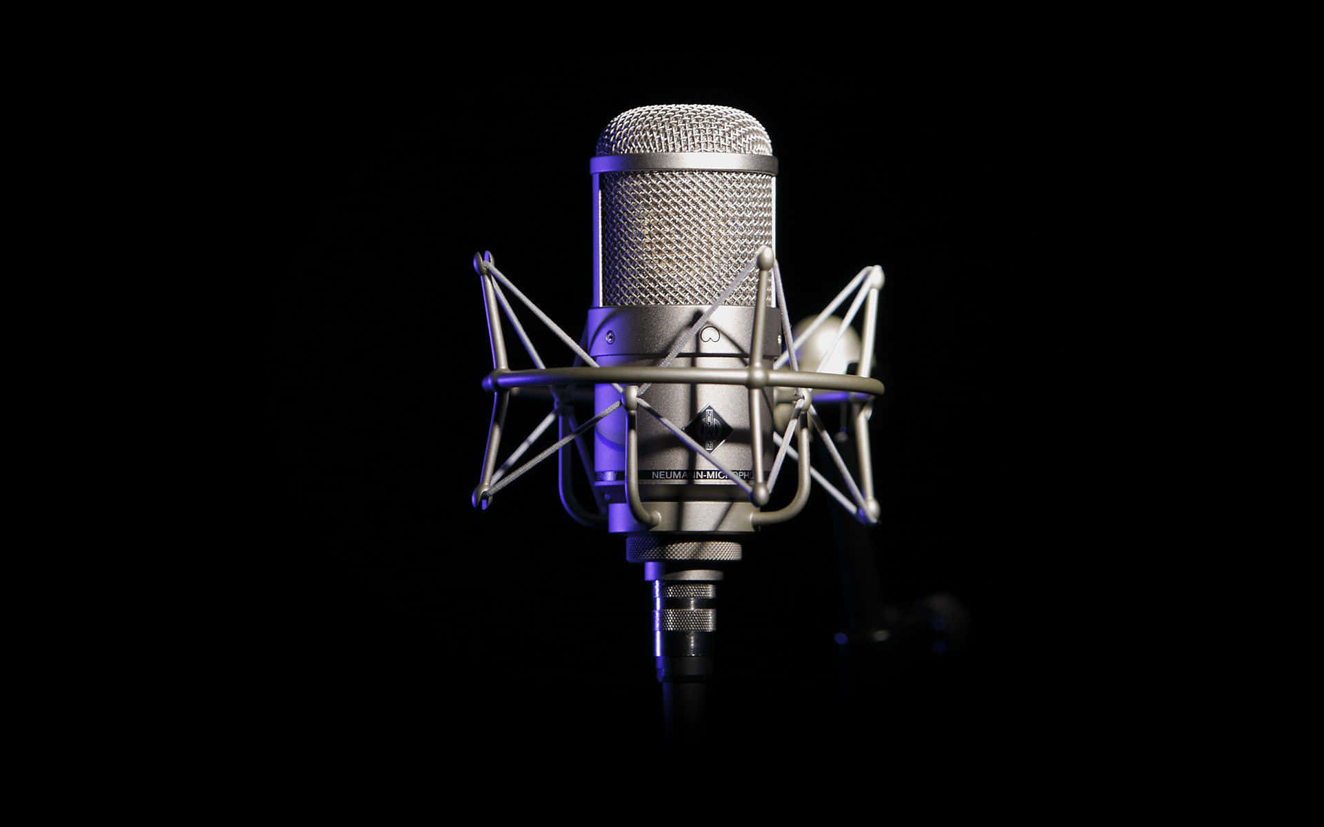 Condenser Microphone In The Spotlight Wallpaper
