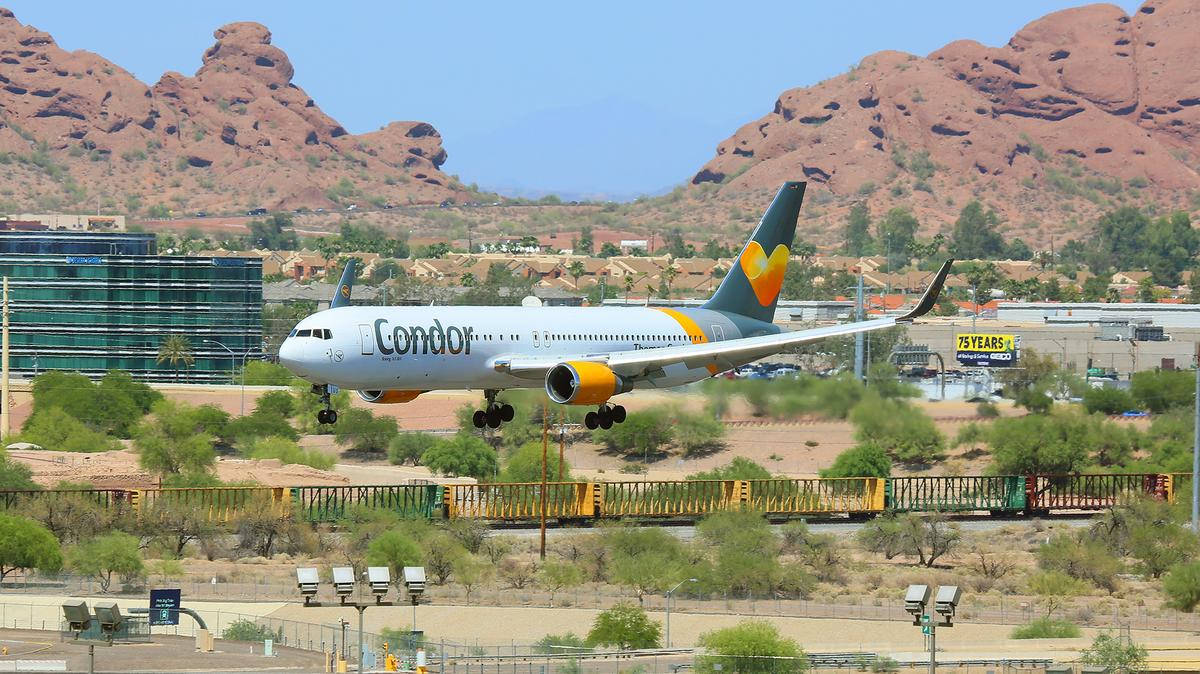 Condor Airlines Gliding Above Airport Wallpaper