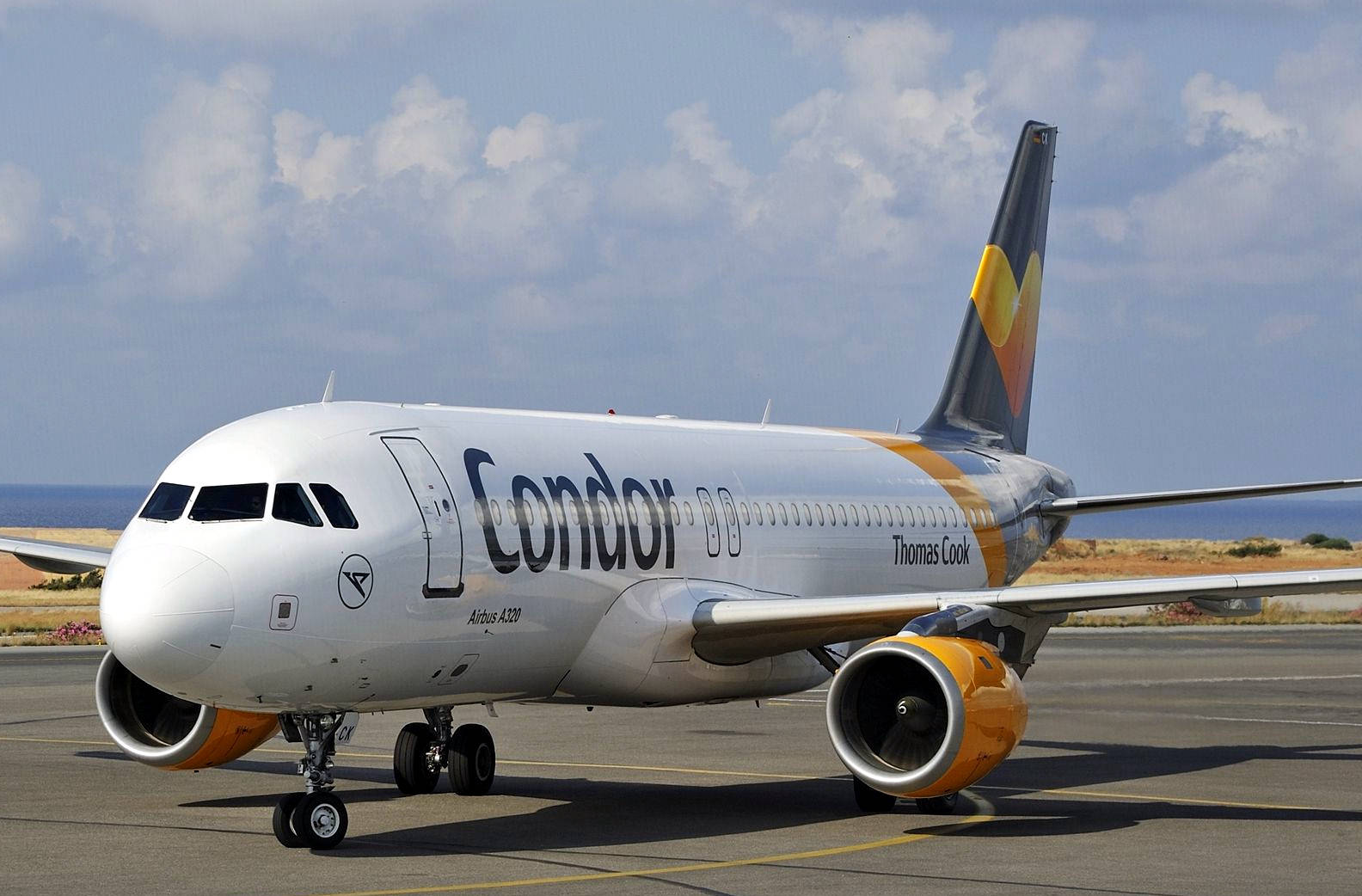 Condor Airlines Parked Passenger Airplane Wallpaper