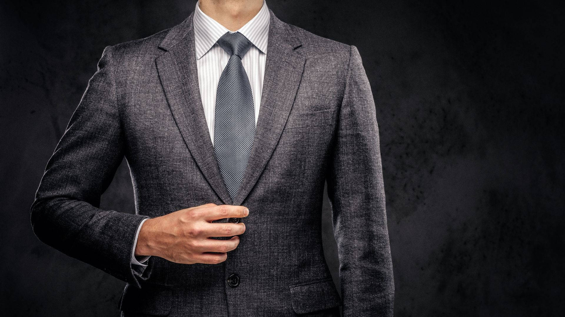Confident Businessman Suit Gray Background