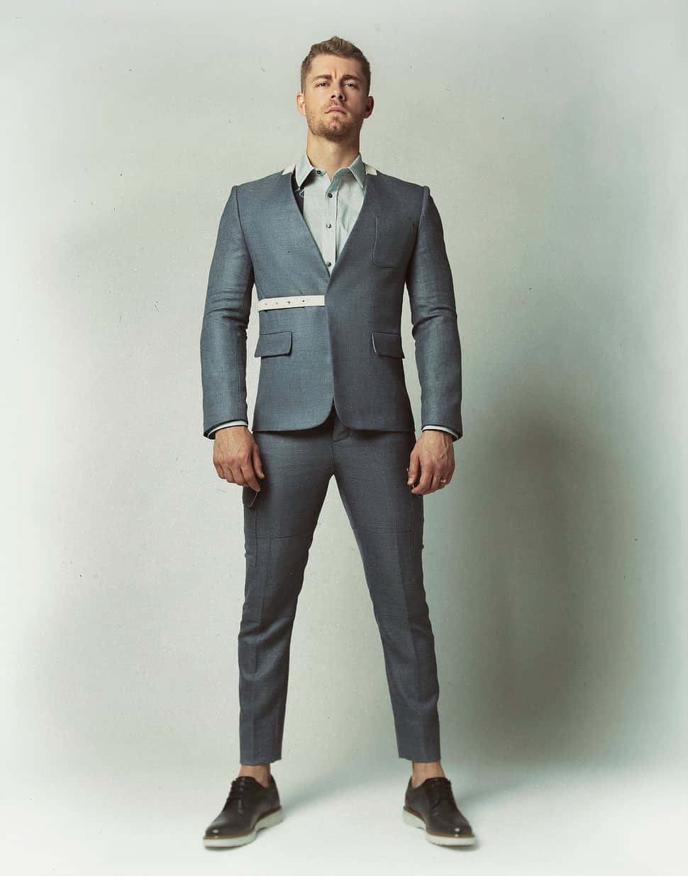 Confident Manin Modern Suit Wallpaper