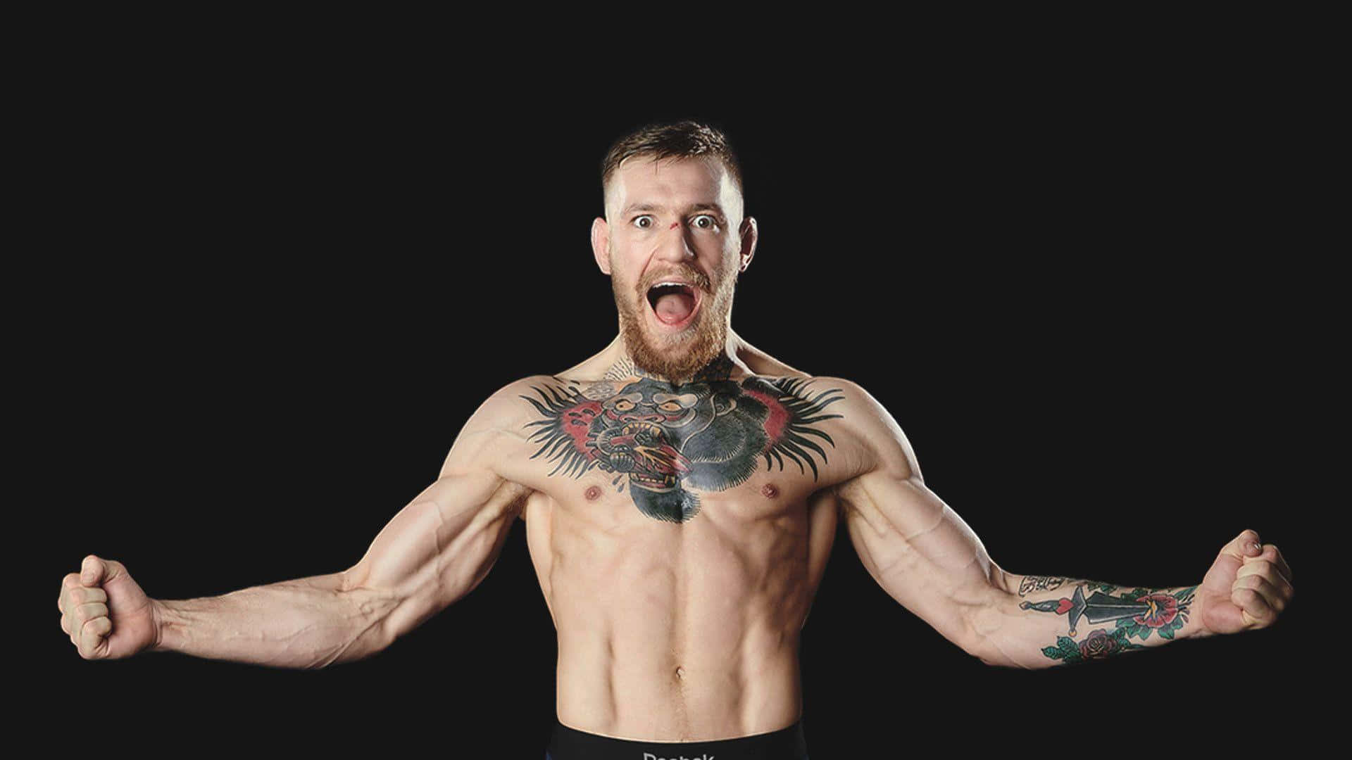 Conor McGregor stands victorious atop an octagon in Prague