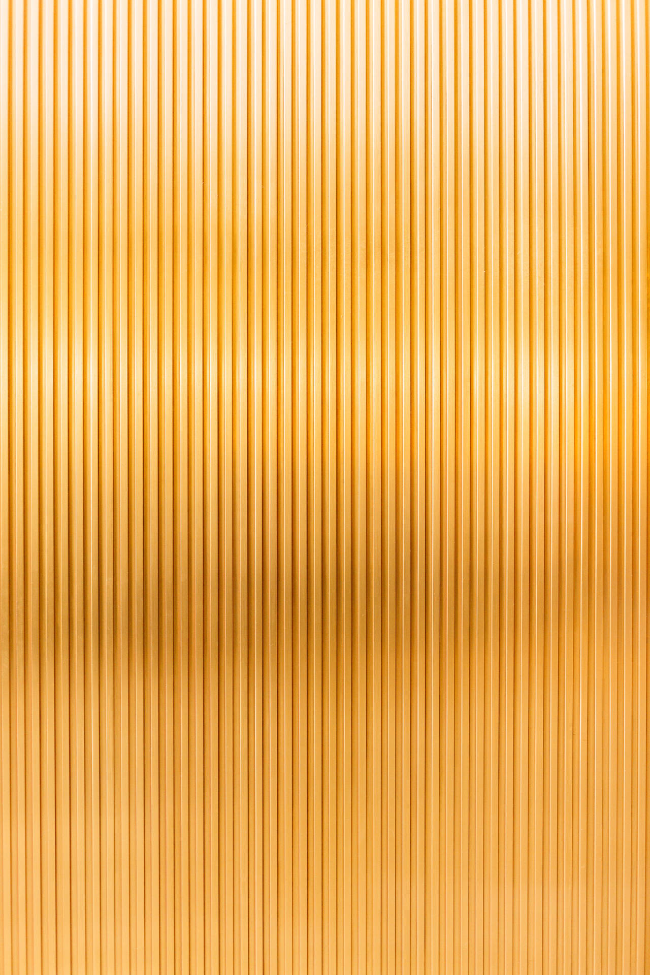 Consistent Vertical Lines In Gold Texture Wallpaper