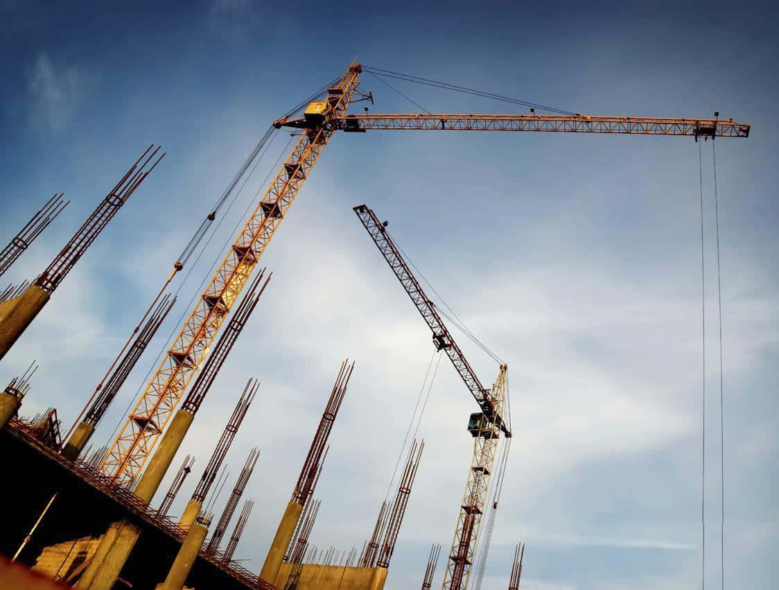 Construction Cranes On A Construction Site