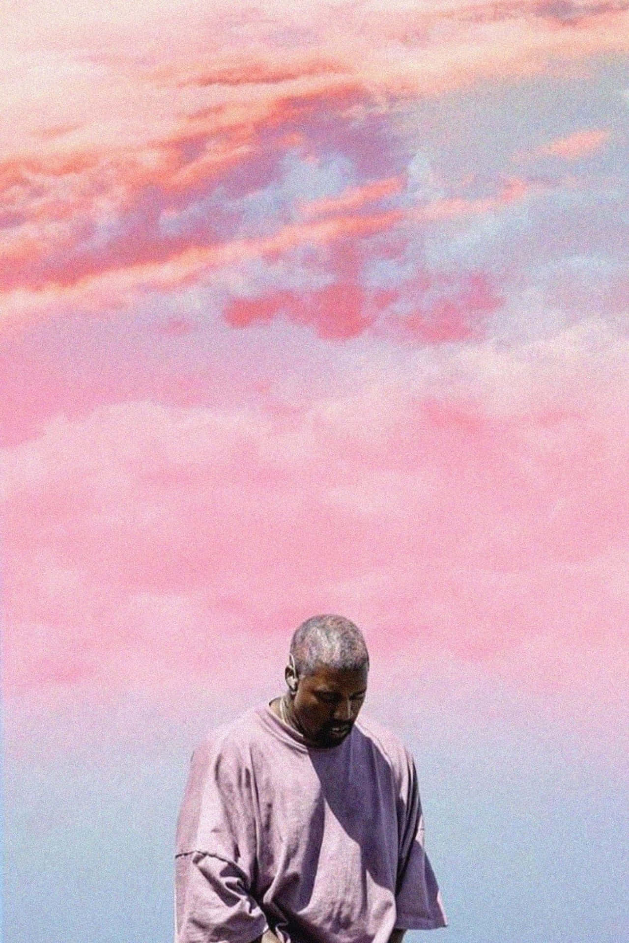 Contemplative_ Figure_ Under_ Cotton_ Candy_ Skies.jpg Wallpaper