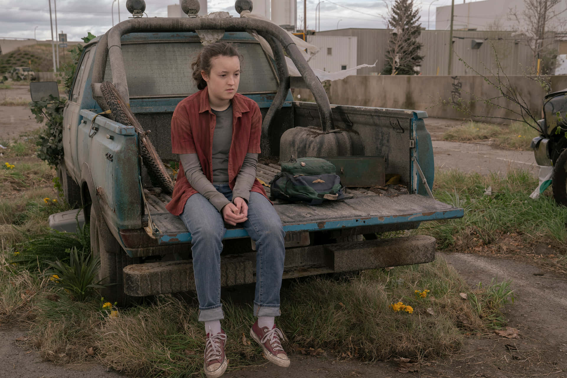 Contemplative Teen On Rusty Truck Wallpaper