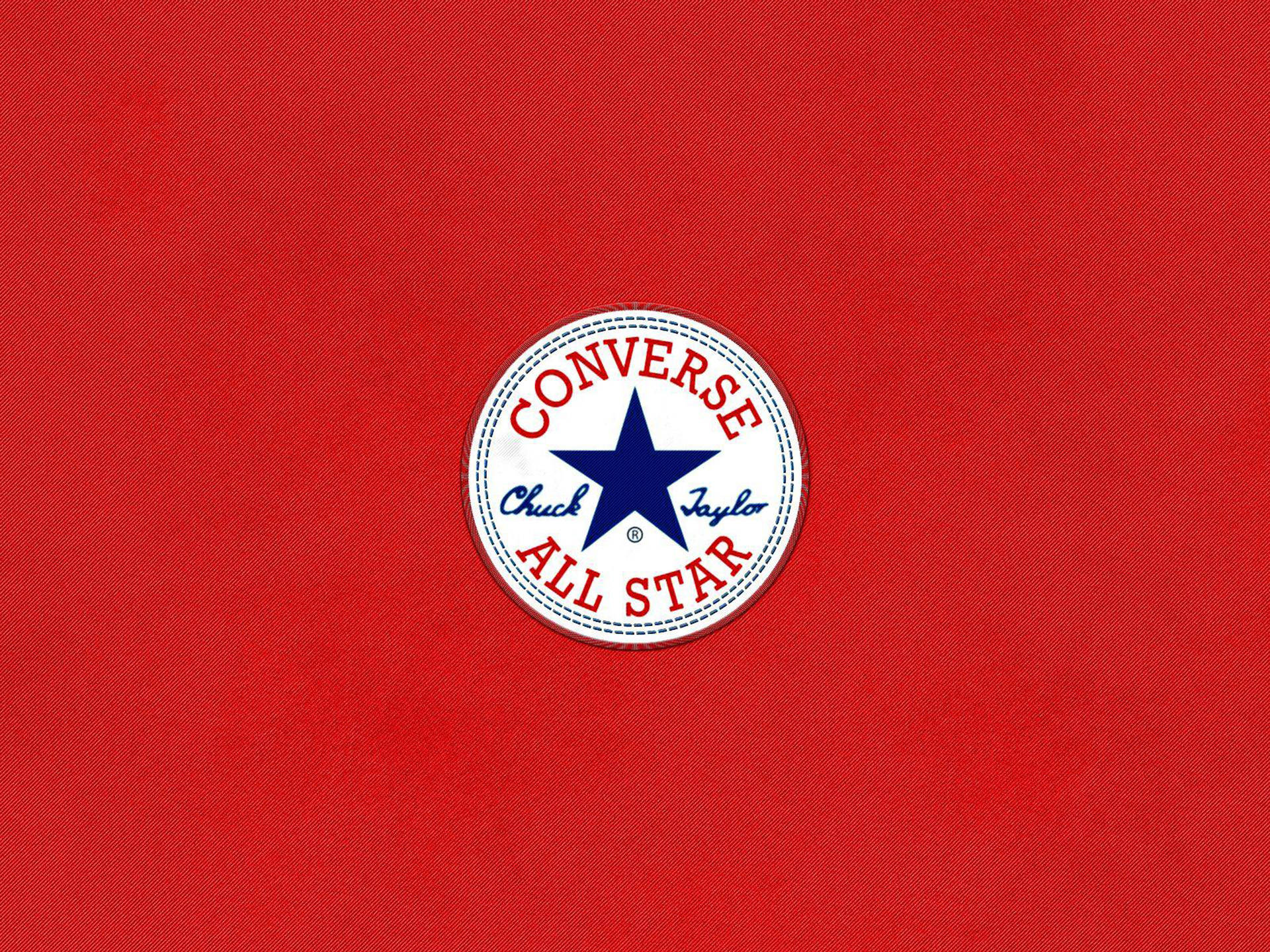 Logo af Converse på rød baggrund Wallpaper