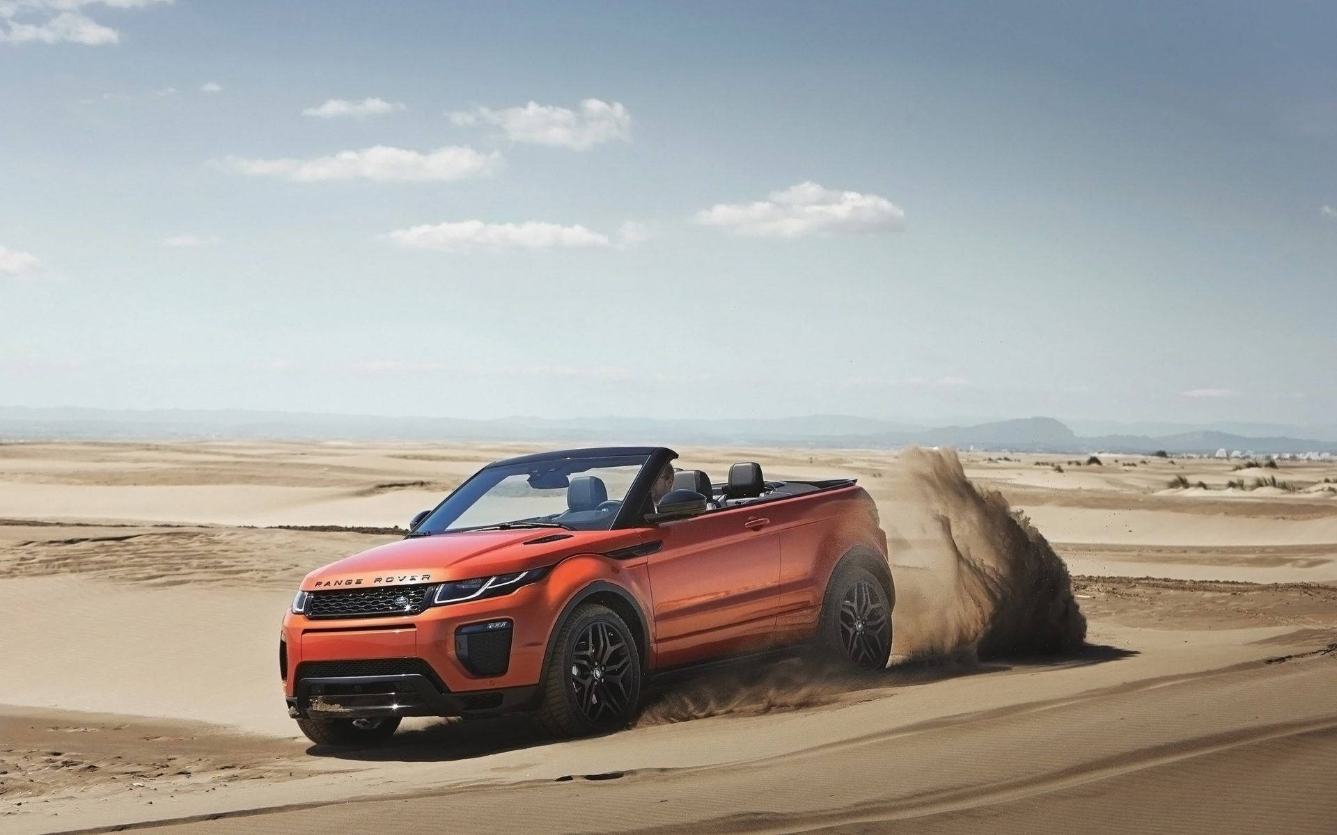 Take your next adventure in a luxurious Convertible Land Rover Wallpaper