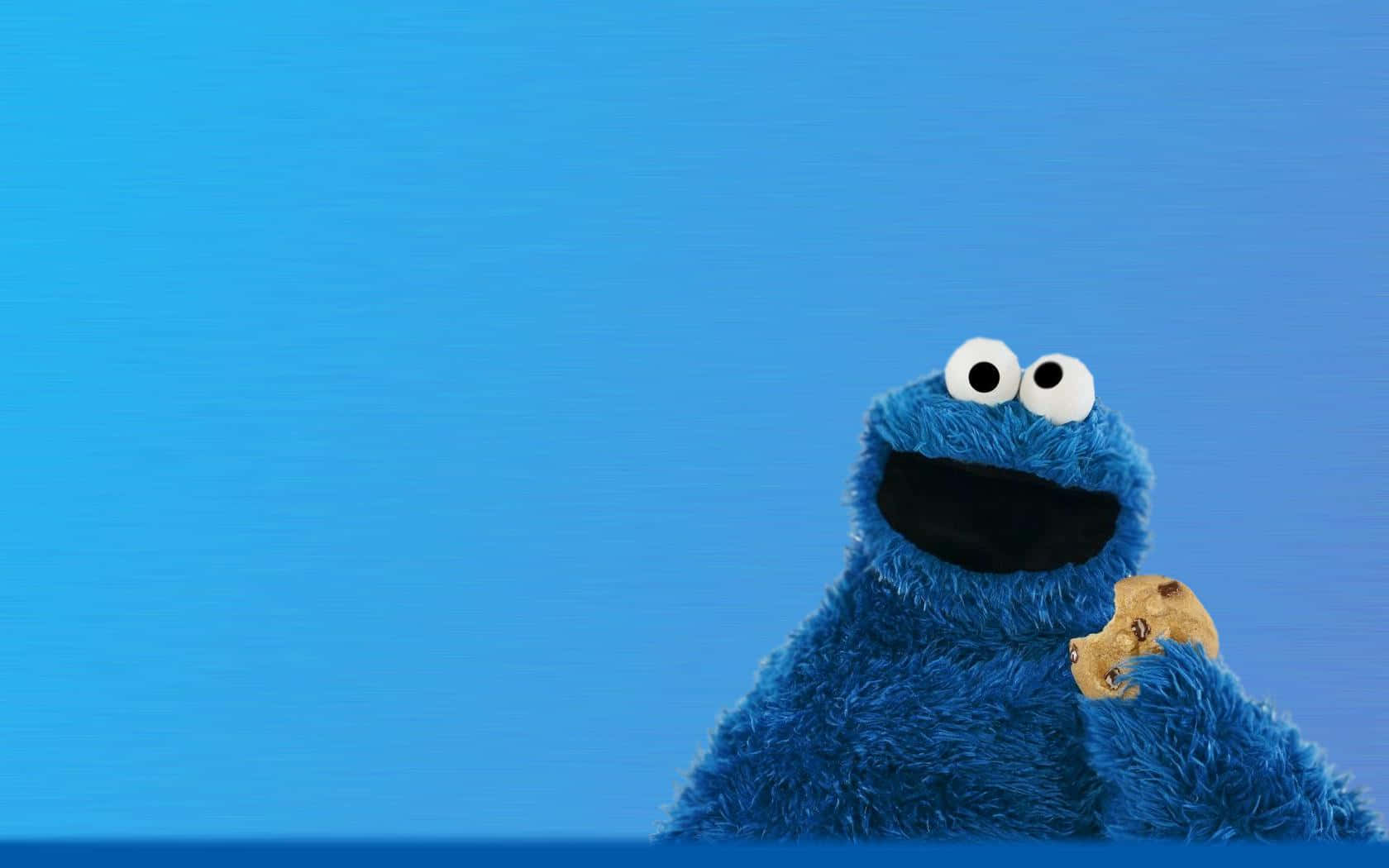 Cookie Monster enjoying a delicious cookie feast