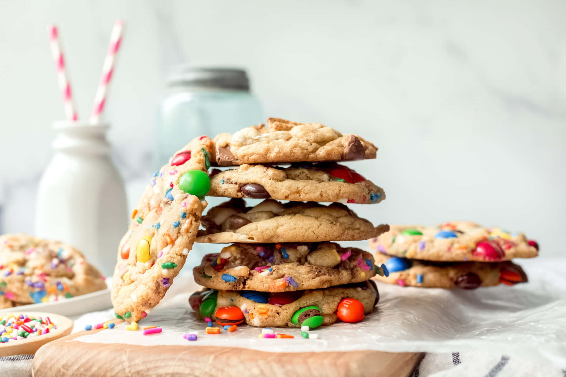 A Stack Of Cookies With Sprinkles And M&ms