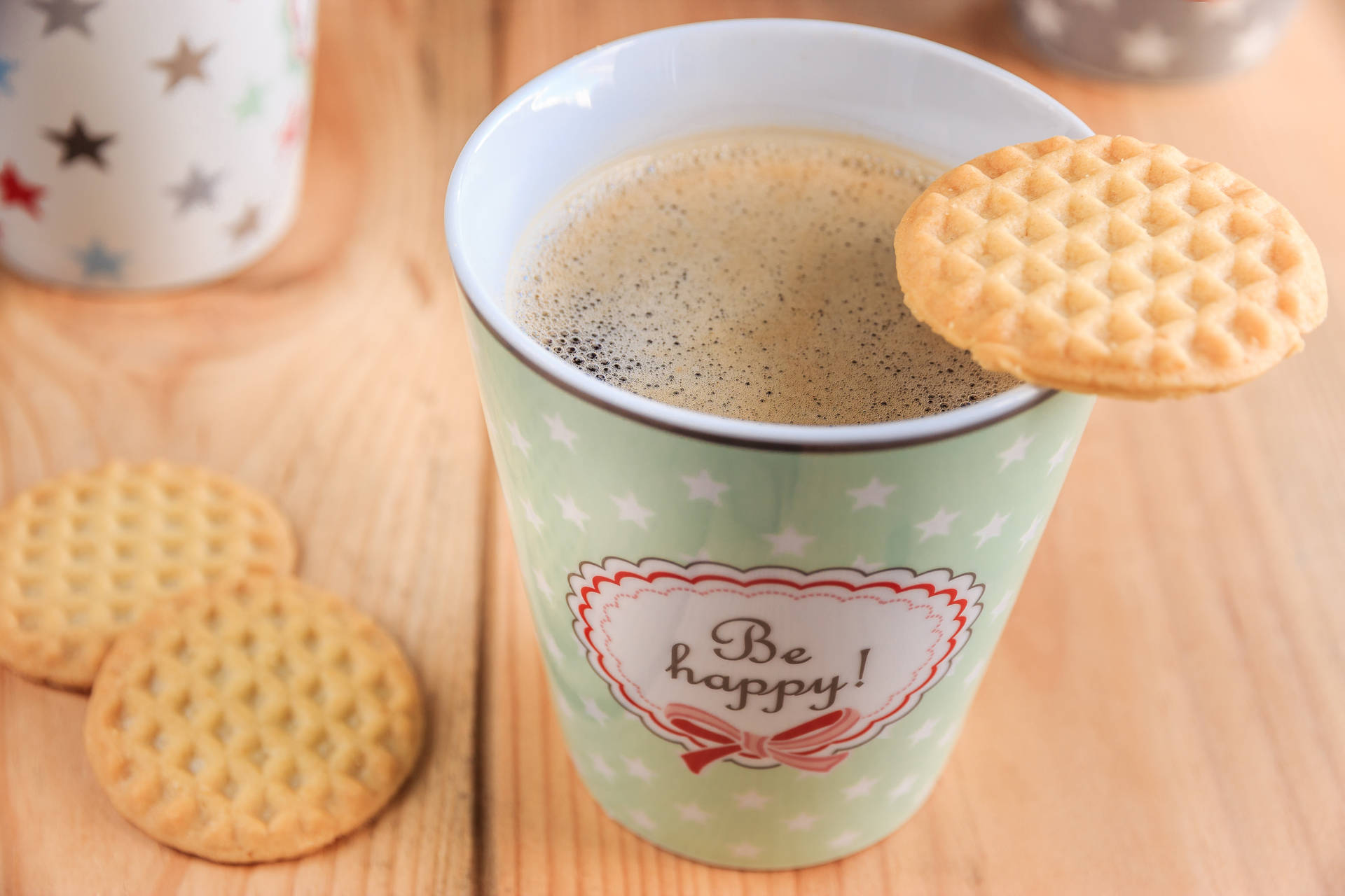 Enjoy the perfect afternoon snack with a delicious cup of coffee Wallpaper