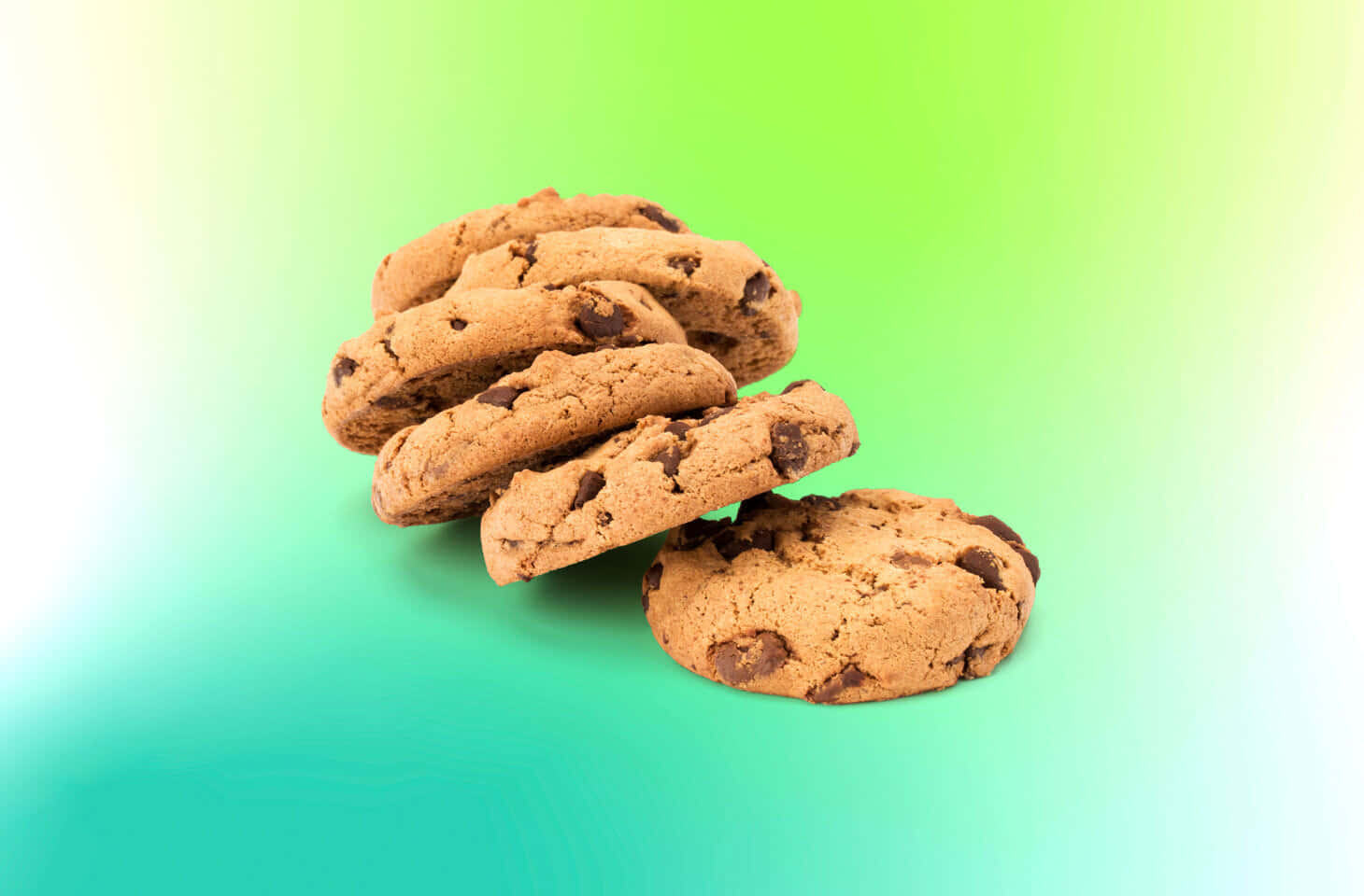 Chocolate Chip Cookies On A Green Background