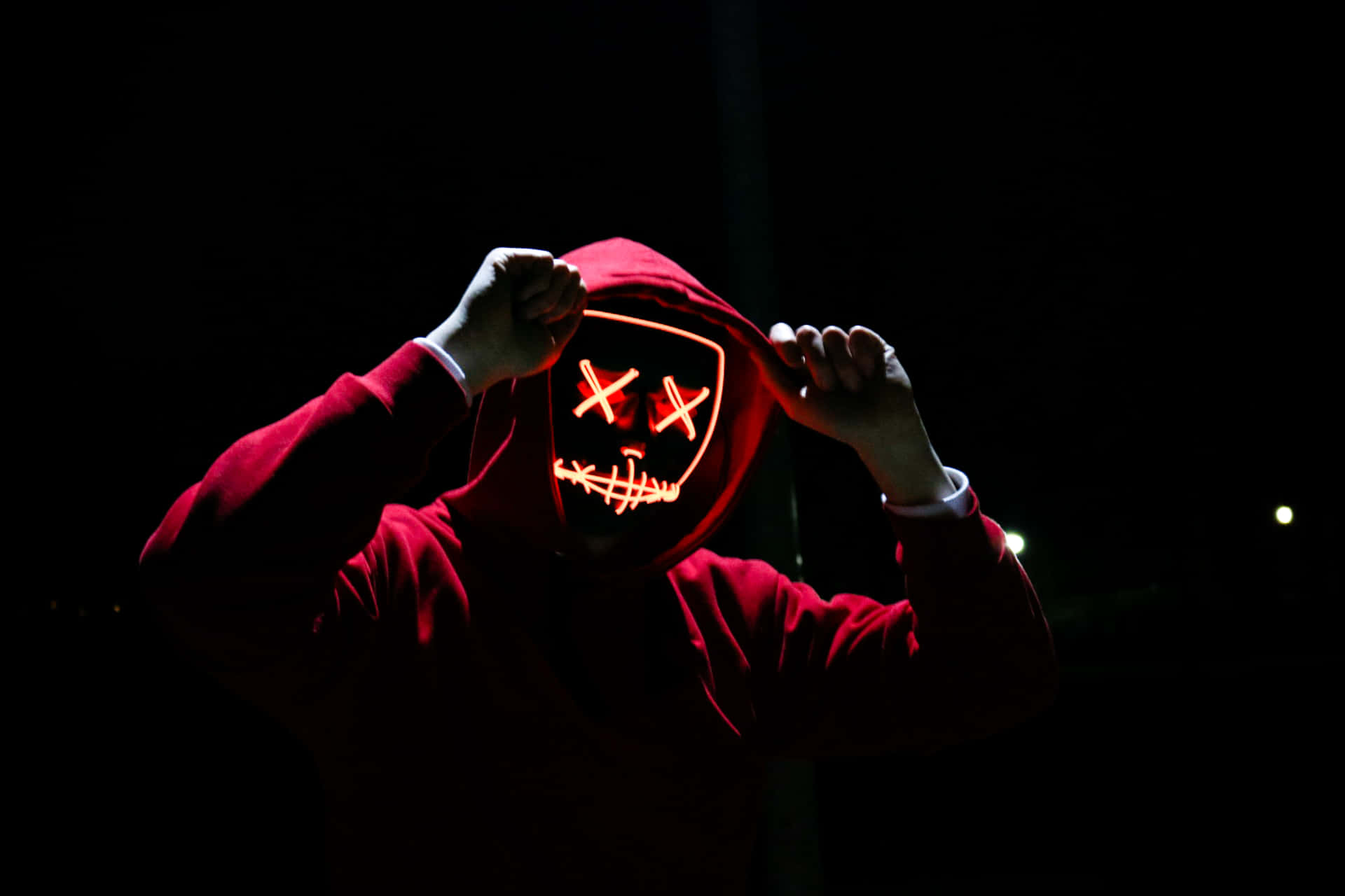 A Person In A Red Hoodie Wallpaper