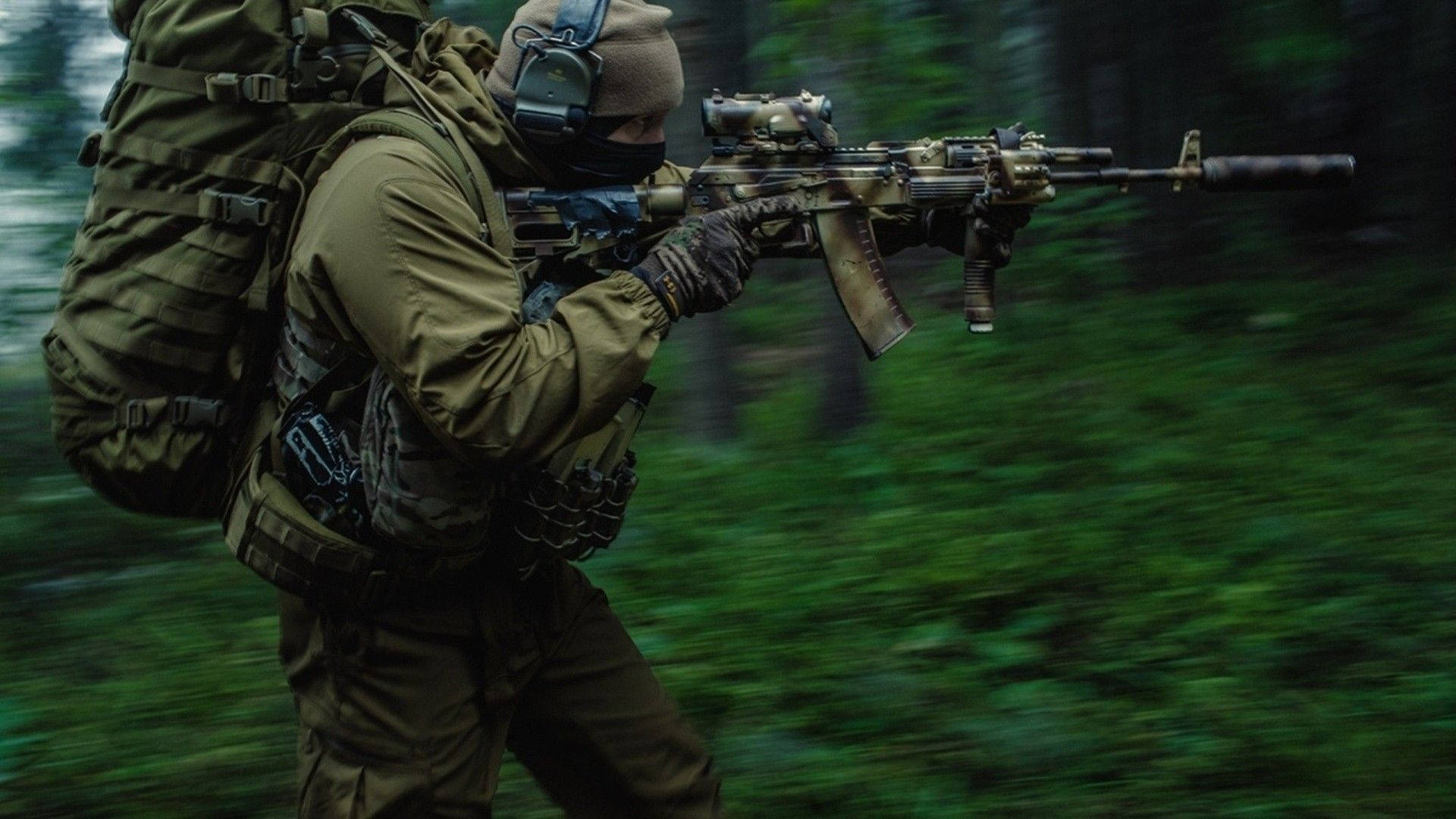 A Soldier In A Backpack Is Holding An Ak - 47 Rifle Wallpaper