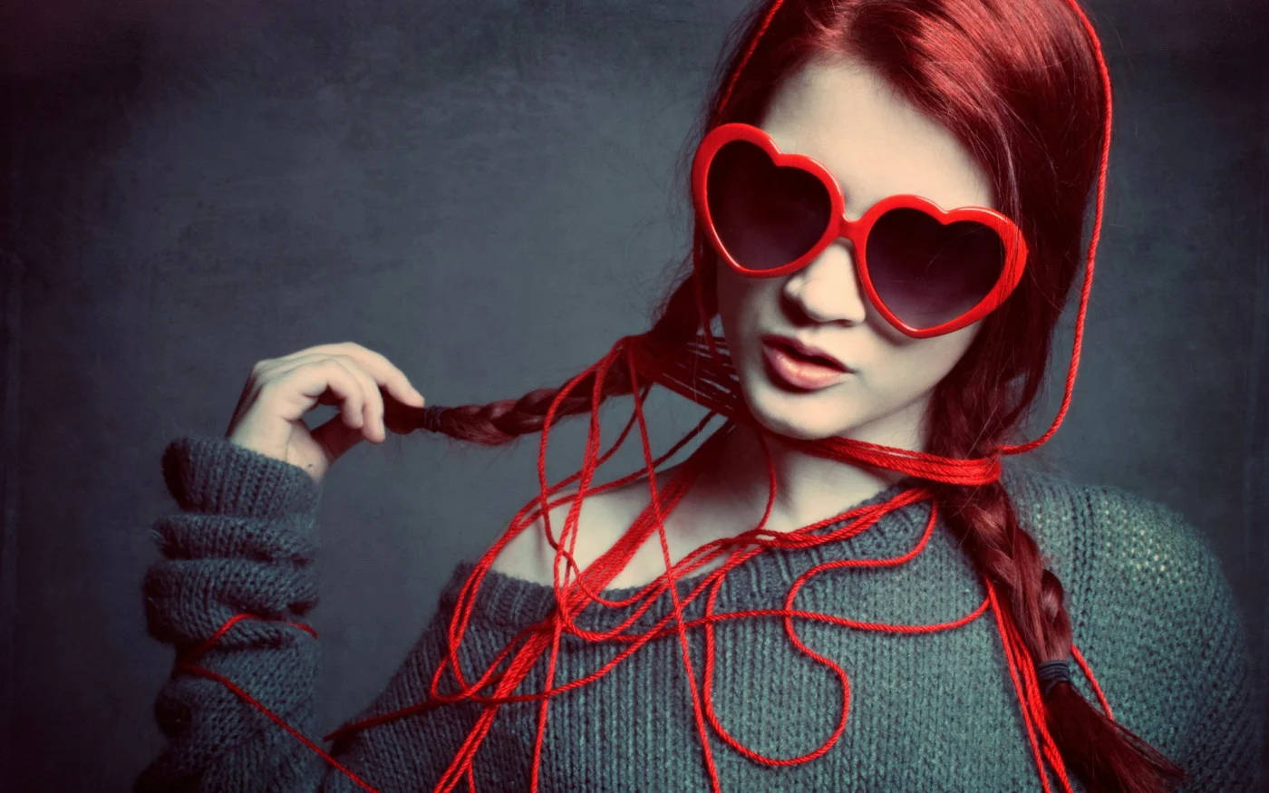Cool Attitude Girl With Braided Red Hair Background