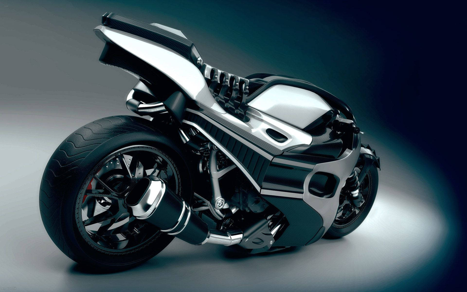 A Black And Silver Motorcycle Is Shown In A Dark Room Wallpaper