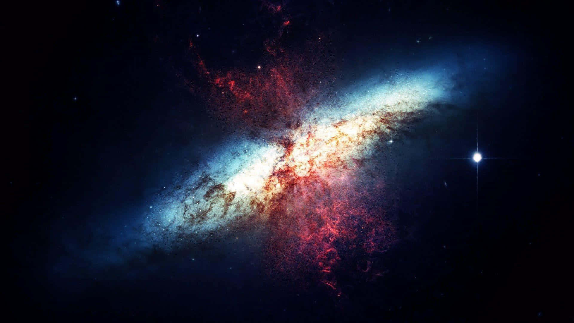 Upplevskönheten I Cool Blue Galaxy Och Dess Stjärnor Som Bakgrundsbild För Din Dator Eller Mobil. Wallpaper
