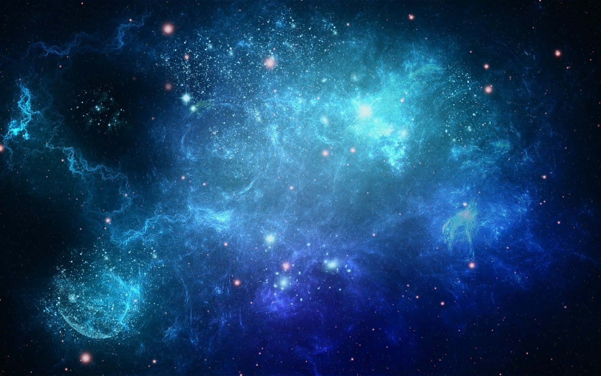 Radiant Colors Out Of This World - A Grandiose Blue Galaxy Radiates In A Dark Night Sky Wallpaper